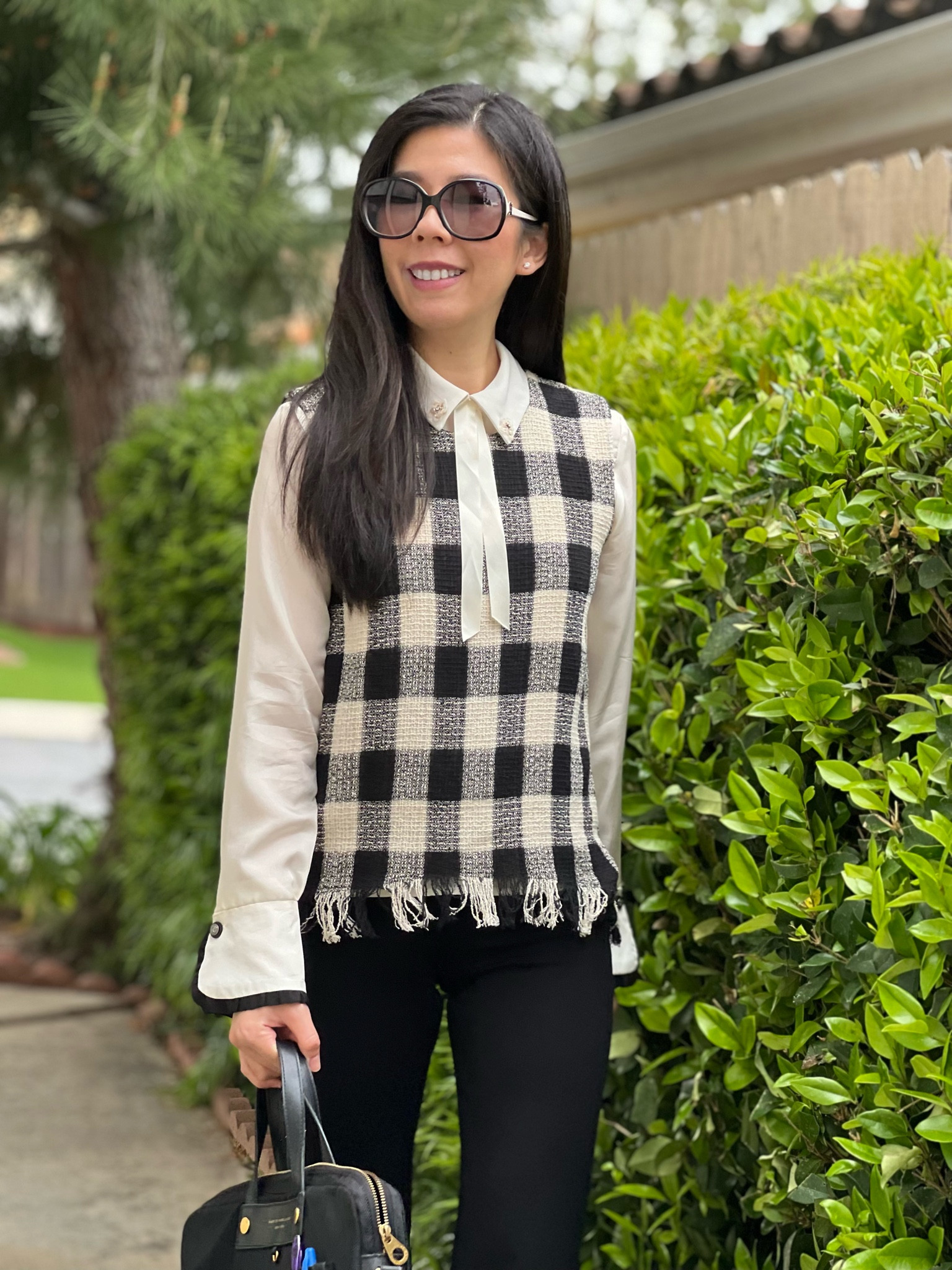 I decided to get creative for work this morning! Instead of adding a jacket or coat, I decided to layer up my tops! I’m wearing three in this look: my long sleeve silk base, a sleeveless collar top in the middle, and a tweed plaid sleeveless fringe sweater vest on top! It kept me warm as the air was frigid both outdoors and in the office! 

#LTKFind #LTKstyletip #LTKworkwear