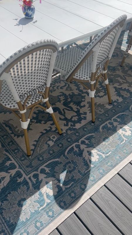 White outdoor table and bistro chairs. Outdoor rug 

#LTKhome