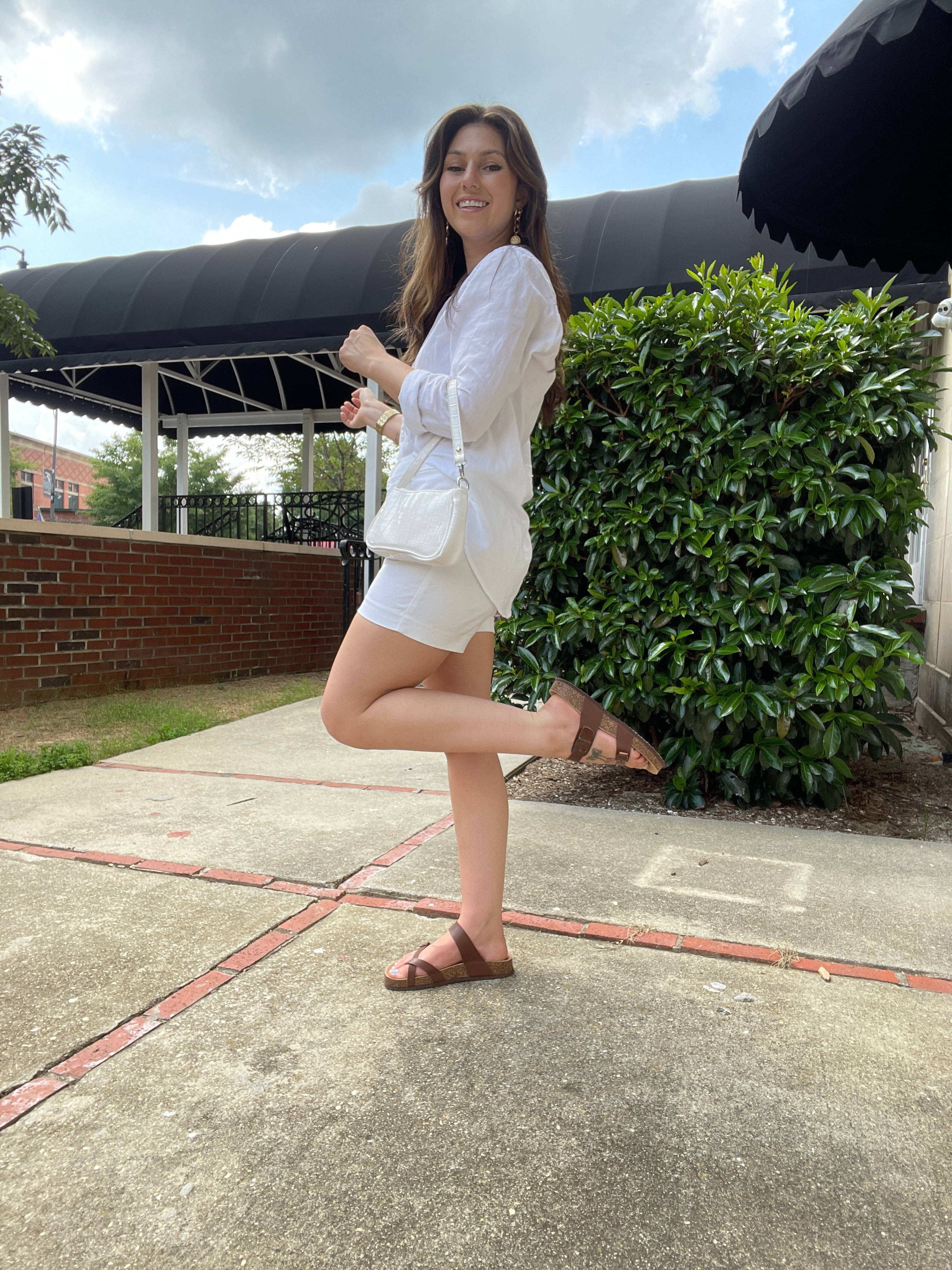 All white summertime outfit, summer outfit, mom fashion, mom style, casual fashion, casual style, summertime look, all white summer outfit. I am wearing a white button down shirt from JCPenney, white shorts I forgot where they are originally from, brown sandals and a white shoulder bag. #momfashion #momstyle #ltkmom #ltkfashion #ltkstyle #shopmylook #looks2025 #summer2025 #summerfashion #amazon #ltkamazon  

 #LTKSummerEdit #LTKSeasonal #LTKStyleTip