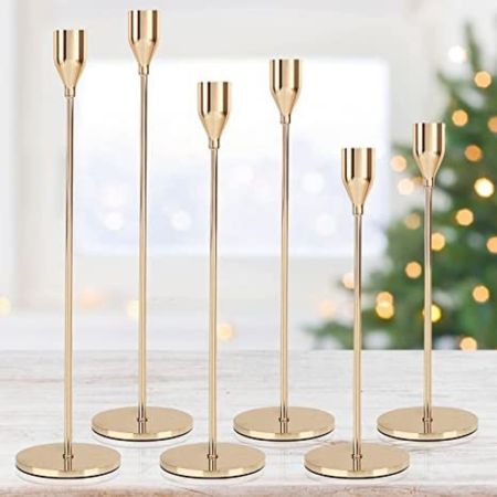 Gold is going to be a major theme for my wedding. I will definitely be using these taper candle stick holders as well as other mix and match ones that I can find to bring an eclectic vibe in to the room 

#LTKunder50 #LTKhome #LTKwedding