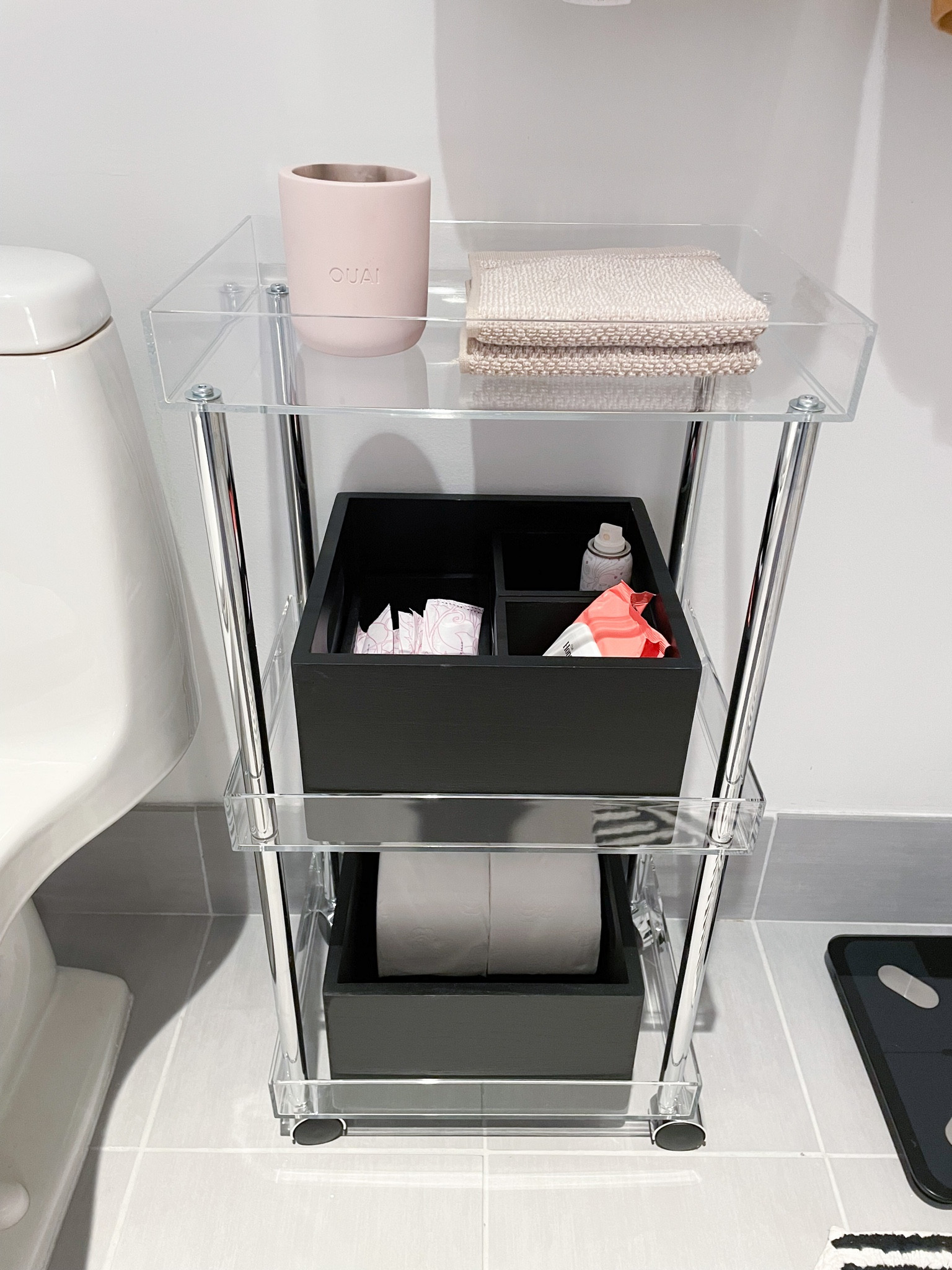This acrylic cart is the perfect addition to any bathroom that needs more storage! Backstock toilet paper, wet wipes, tampons, etc. all in one place for your convenience

Container store finds, the home edit organization 

#LTKhome