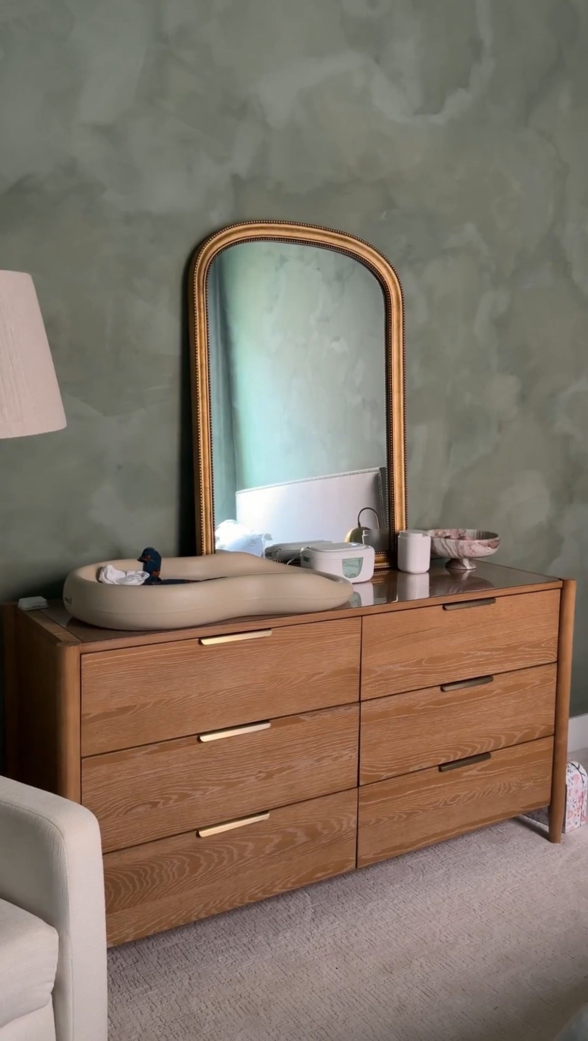 Stunning six drawer dresser with soft close drawers in our guest bedroom, which is a temporary nursery! The natural color is actually much warmer in person. The gold mirror is on sale for WayDay! Love the size and price  

#LTKStyleTip #LTKSaleAlert #LTKHome