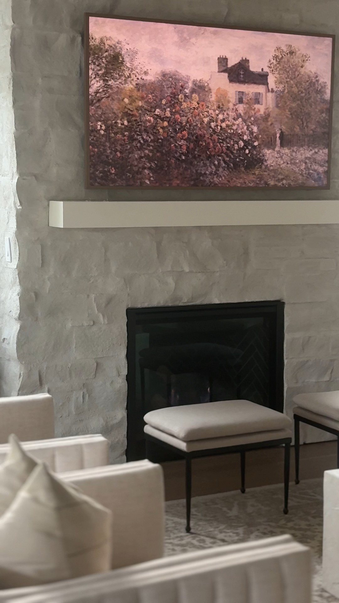 A stone fireplace moment that feels warm, calm, and collected 🤍
Soft neutrals, classic art, and clean lines create a space that feels finished without feeling formal. Everything linked. 

 #LTKHome