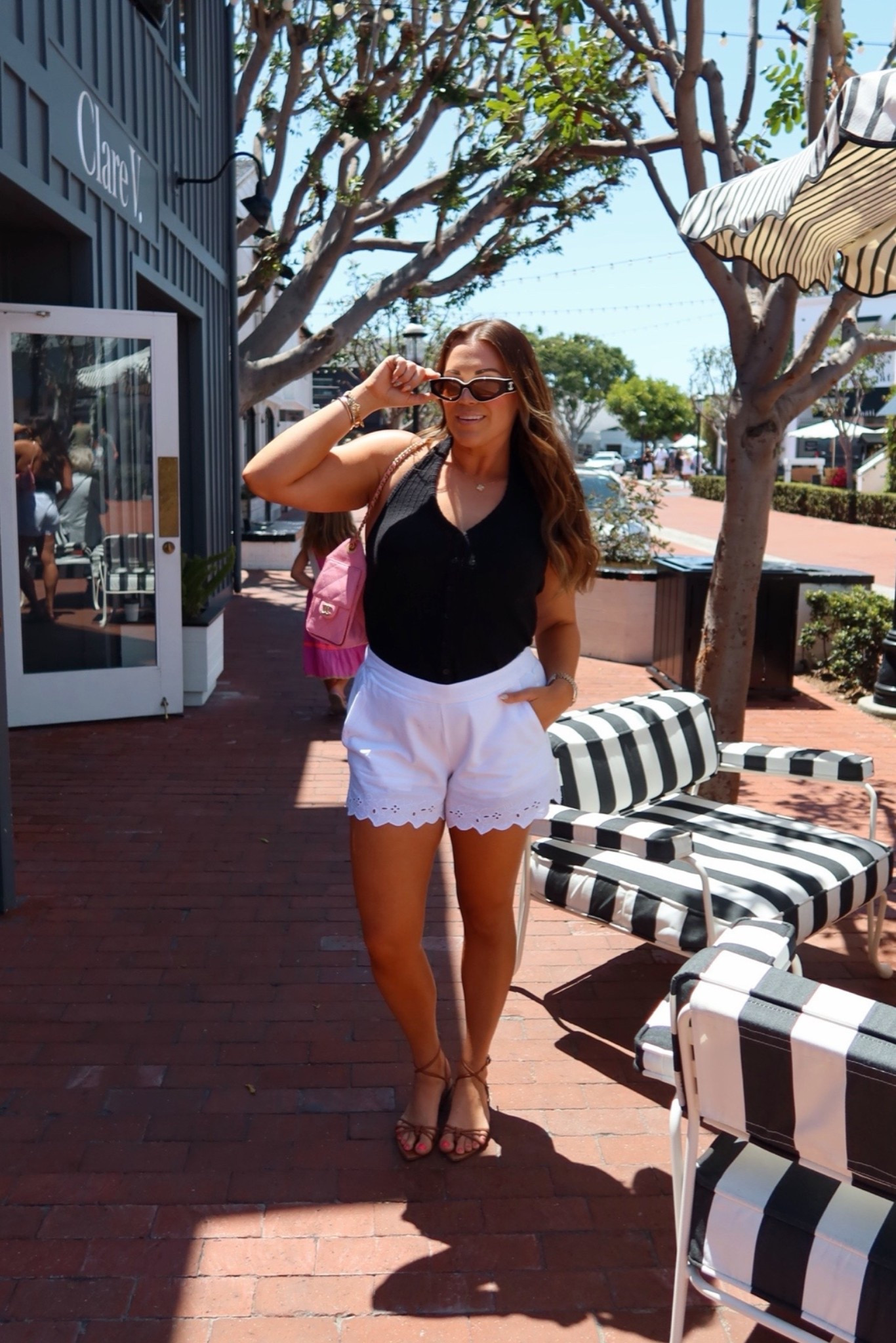 curvy midsize black and white summer outfit! wearing medium in black halter top and white eyelet shorts 🖤🤍

#LTKSeasonal #LTKMidsize #LTKTravel