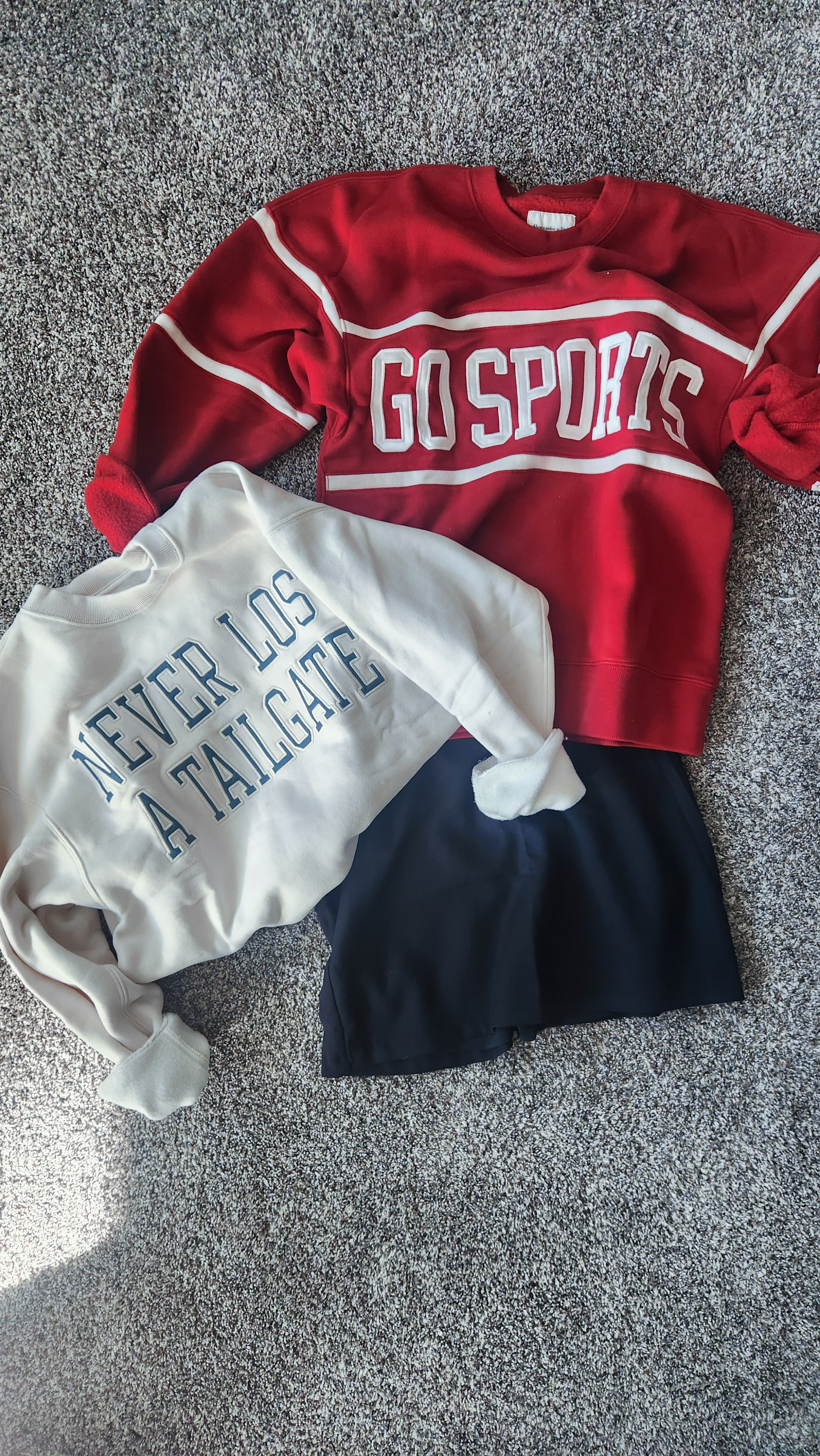 Sale on the best sweatshirts and skorts at A+F! (Grey sweatshirt is a color option on the red tagged shirt!!#gosports #football #superbowl

