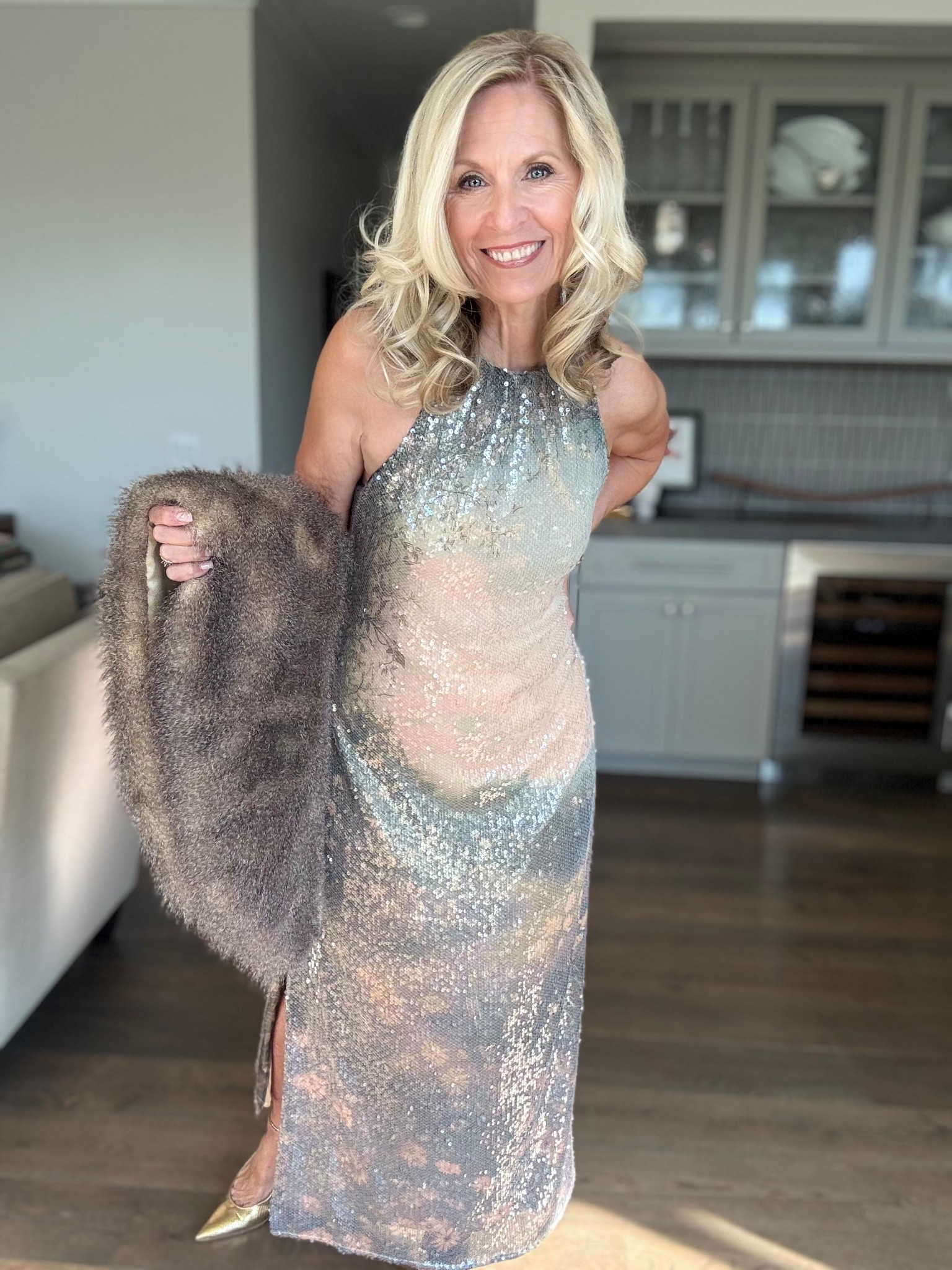 It’s easy to dream in this dress.

If you are looking for a dress that is not your usual sequins this is it. The muted colors blend so beautifully. It’s not loud, but definitely gets your attention when entering a room. No need for a lot of accessories with this beauty. It speaks for itself.

On sale for a limited time too.

Follow me for more 50+ style inspiration.

#LTKSaleAlert #LTKHoliday #LTKOver40