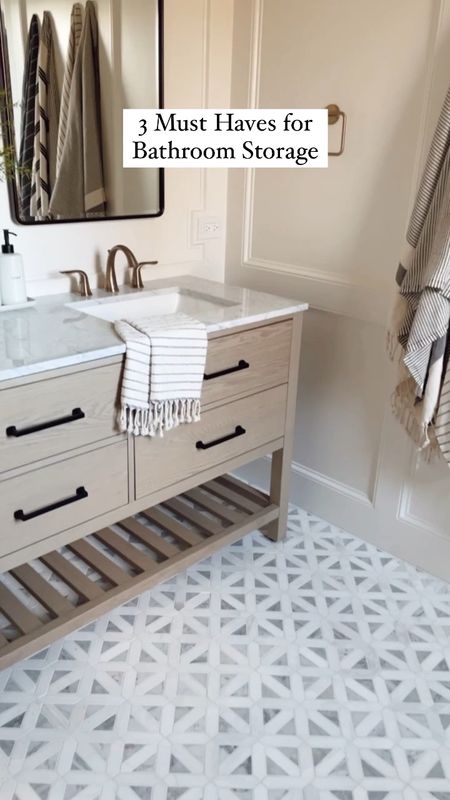 Bathroom storage must have. Baskets. Recessed medicine cabinet. Bathroom mirror. Bathroom vanity. Marble tile. Turkish towels. Bathroom faucet. Drawer handle. Bathroom design.

#LTKhome