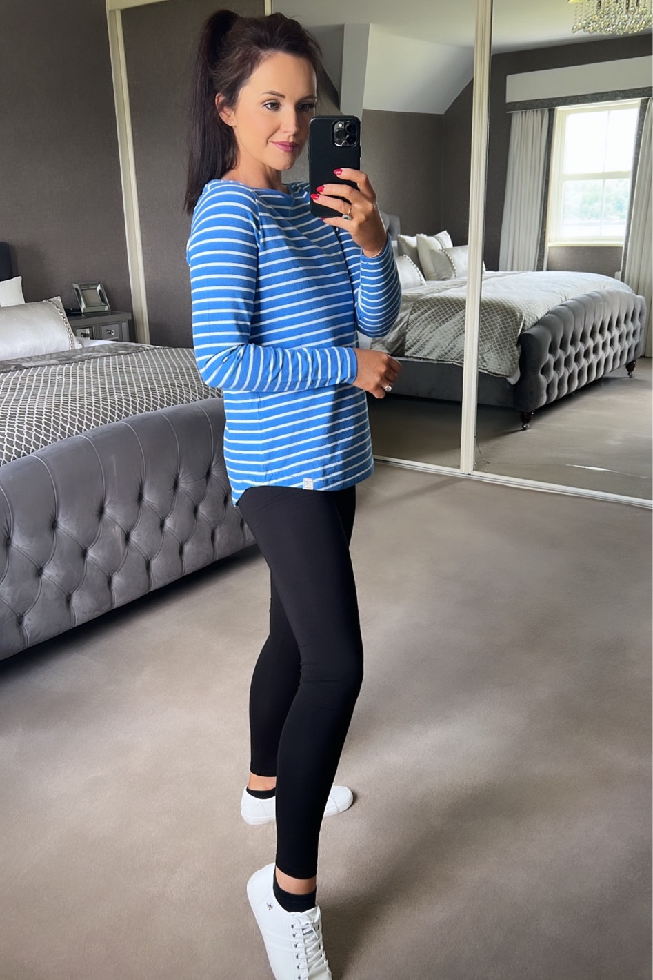 Blue stripe top, stripe top, black leggings, white trainers, trainers, casual style, working from home 

#LTKworkwear #LTKunder50 #LTKsalealert