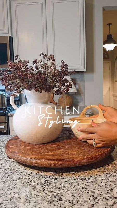 Kitchen island styling✨️Love this vase with the braided handles. I'll be moving it out around all spring and summer. Plus, the cutest organic modern berry bowls.  

#LTKhome #LTKVideo #LTKSeasonal