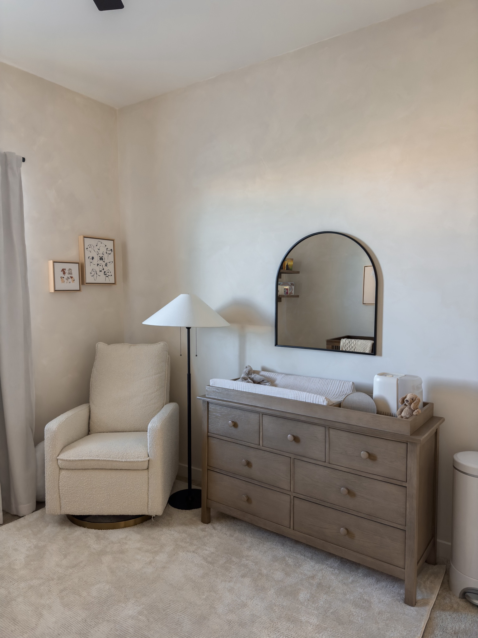 Finally sharing all the details from our nursery 🫶🏽🤍 

Neutral nursery, light brown dresser, white chair, buccle chair, blackout curtains, neutral nursery, washable rug 

#LTKHome #LTKBaby #LTKBump