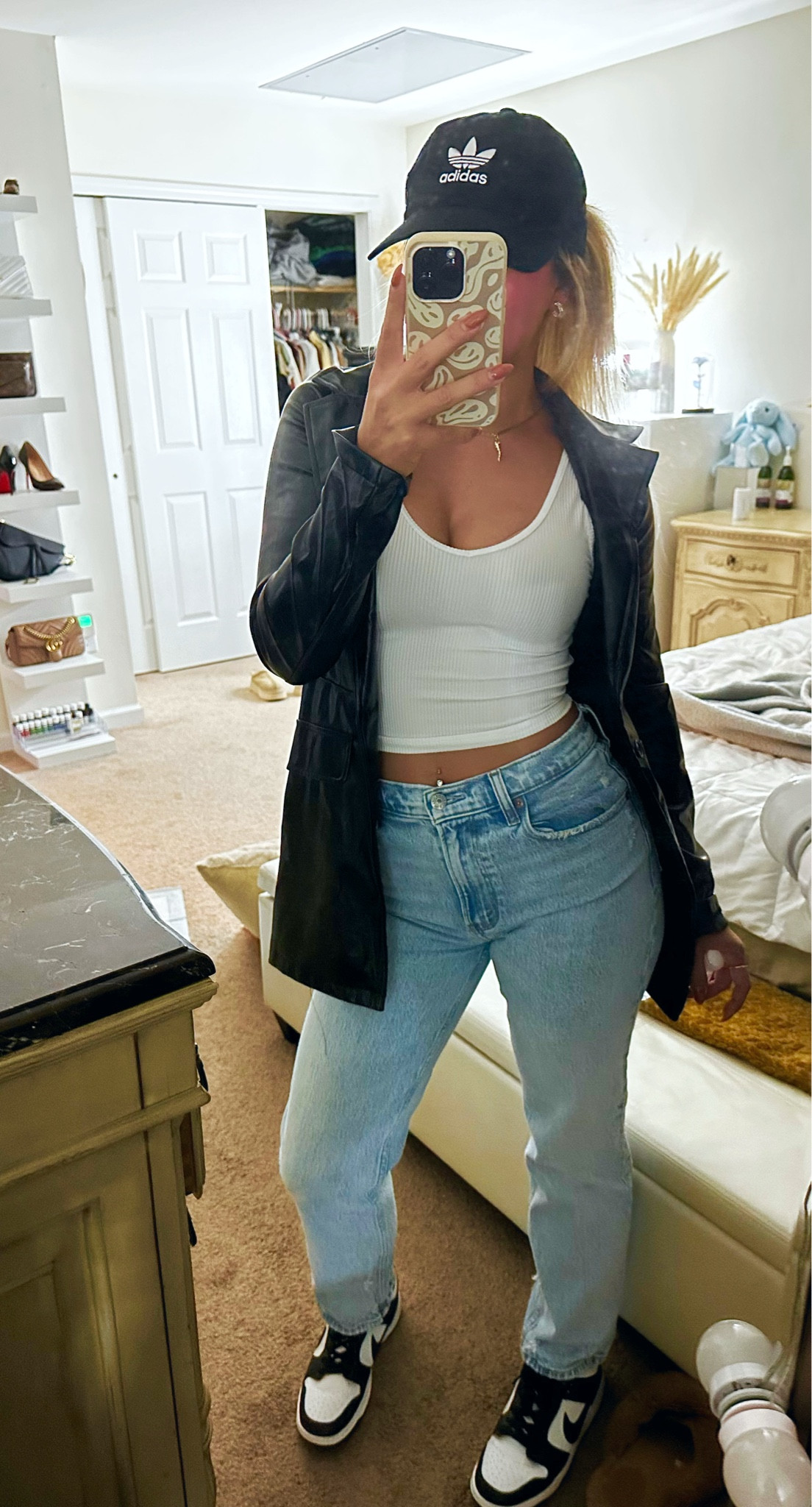 Casual chic for laid back days🖤 comprised of statement pieces that you can rework again and again. Sized down to an XS in the blazer for a more fitted look. Tank is a size small (I wear it soooo often) and jeans are a size 26. Wearing the Nike panda dunks but you could get this look with really any color blocked sneaker. Accessories also linked!

#LTKHalloween #LTKSeasonal #LTKstyletip