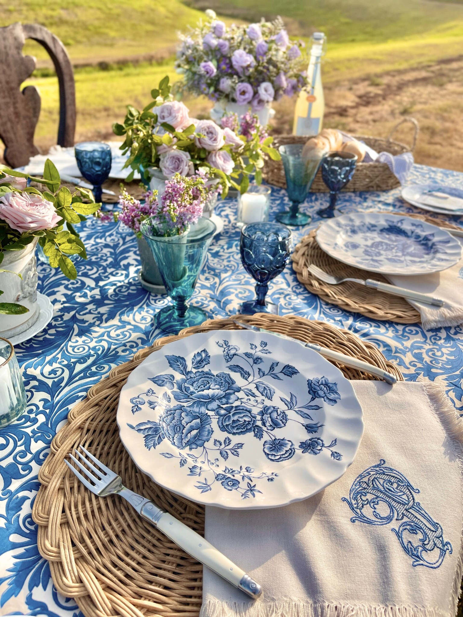 Love the look and feel of a France inspired table setting? This #frenchprovence themed Tablescape is perfect for spring picnics and lunch or dinner outside! It would also make for a lovely wedding dinner table setting idea #provence #summertable #summertablescape #dinnerware #tableware #summertableware 

#LTKeurope #LTKFind 

#LTKSeasonal