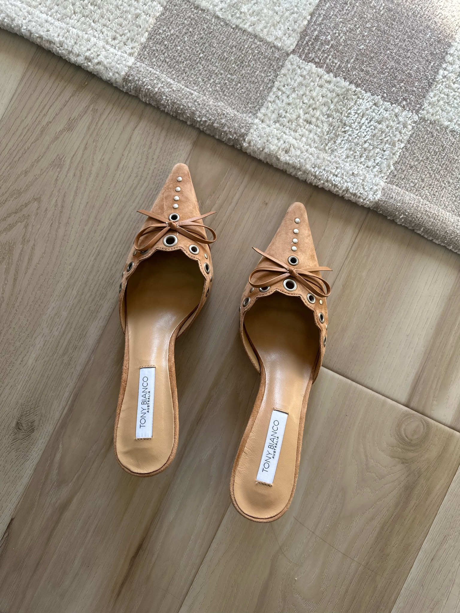 Obsessed with these camel colored kitten heel mules! They're suede and country chic which is a major trend right now in fashion! These pair perfectly with jeans, dresses and these Lululemon pants I tagged! 🤎 Side note: this rug in my entry way is on sale right now at Target! 

#LTKstyletip #LTKsalealert #LTKhome
