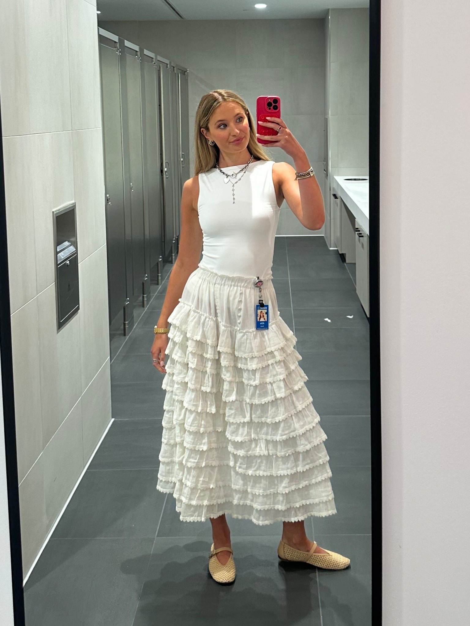 This tank top can be worn reversed like I’m wearing it in the photo! The skirt is not an exact match but is similar. The exact match can be rented on nuuly:)