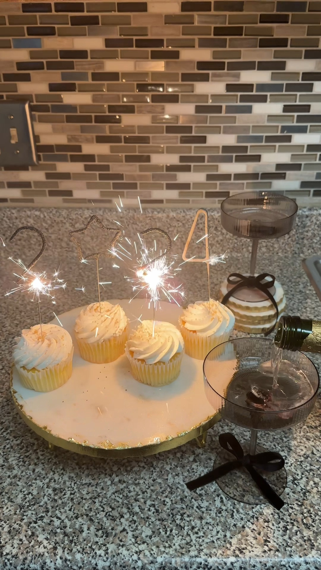 Happy New Year!! 
I used ribbon from Micheals to make a bow in the champagne glasses! How cute!!#LTKHoliday

#LTKSeasonal #LTKhome