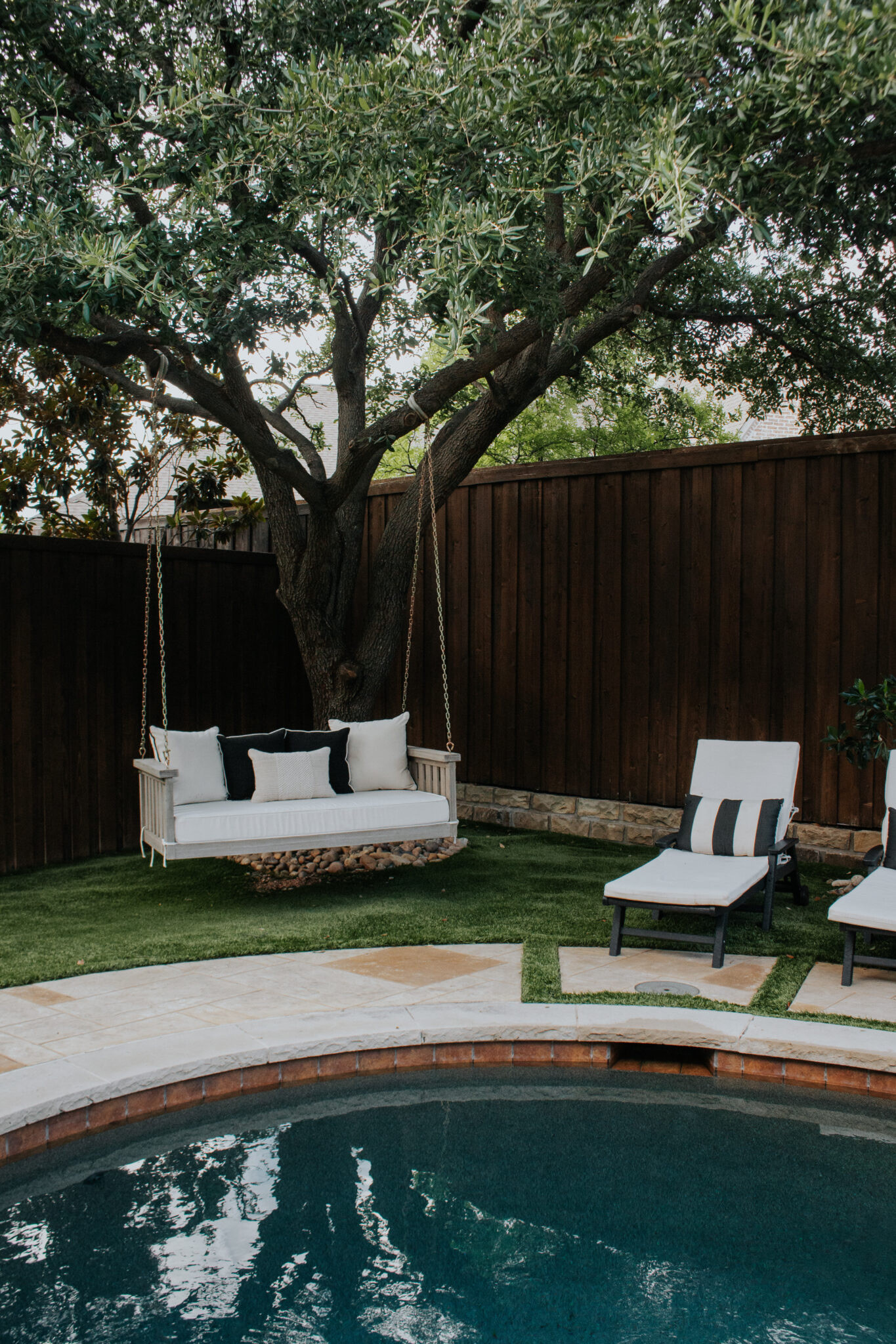 Outdoor decorating inspiration you'll want to save! This transitional backyard combines classic black and white decor, comfortable seating, timeless outdoor furniture, and beautiful styling for the ultimate entertaining space.

#LTKSeasonal #LTKHome