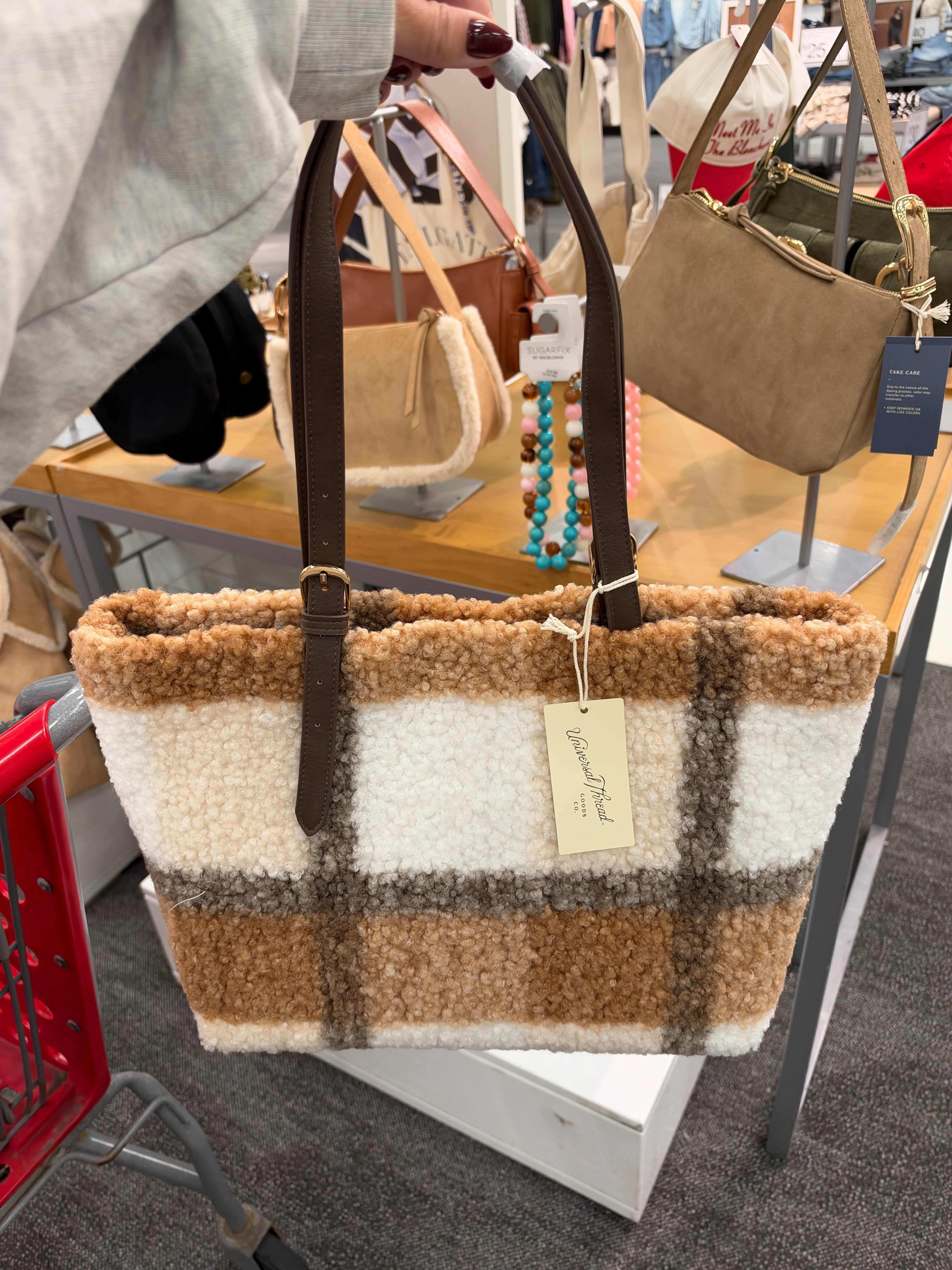 The cutest cozy fall bag just landed at Target! This Universal Thread plaid sherpa tote features warm neutral colors, a soft textured finish, and brown shoulder straps for the perfect fall accessory. Such a cute bag for everyday errands, casual fall outfits, or gifting this holiday season! Tap to check out this Target find and save it to your fall wishlist! fall outfits women over 50, fall wedding guest dresses, fall dresses, wedding guest dress summer, date night outfits, fall fashion hauls, halloween decorations, fall decor, fall shoes, country concert outfits 

 #LTKdayinmylife #LTKgrwm #LTKootd