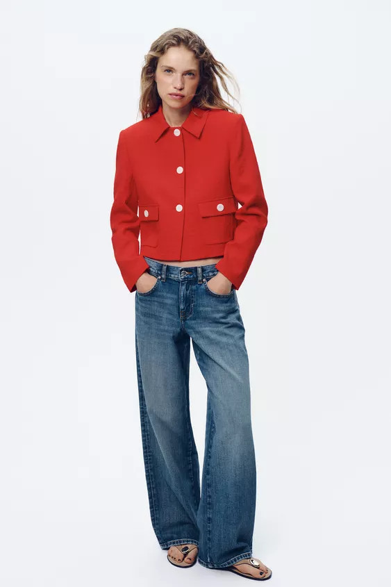 Long sleeve blazer with lapel collar and shoulder pads. Front flap patch pockets. Front button cl... | Zara US