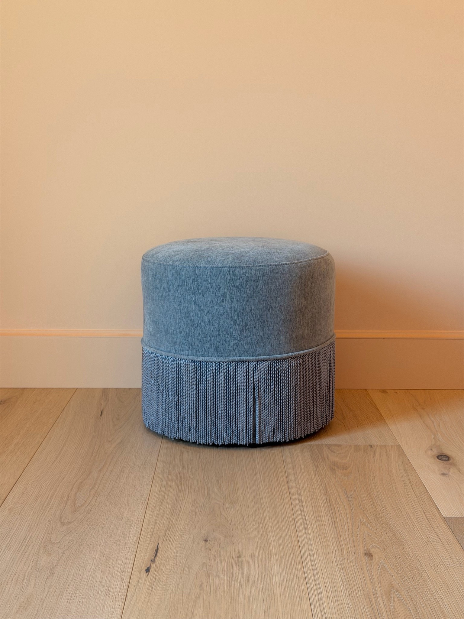 The CUTEST ottoman!!! Such a pretty tone and fun detail with the fringe!! #ottomans #stool

#LTKSeasonal #LTKHome #LTKdayinmylife