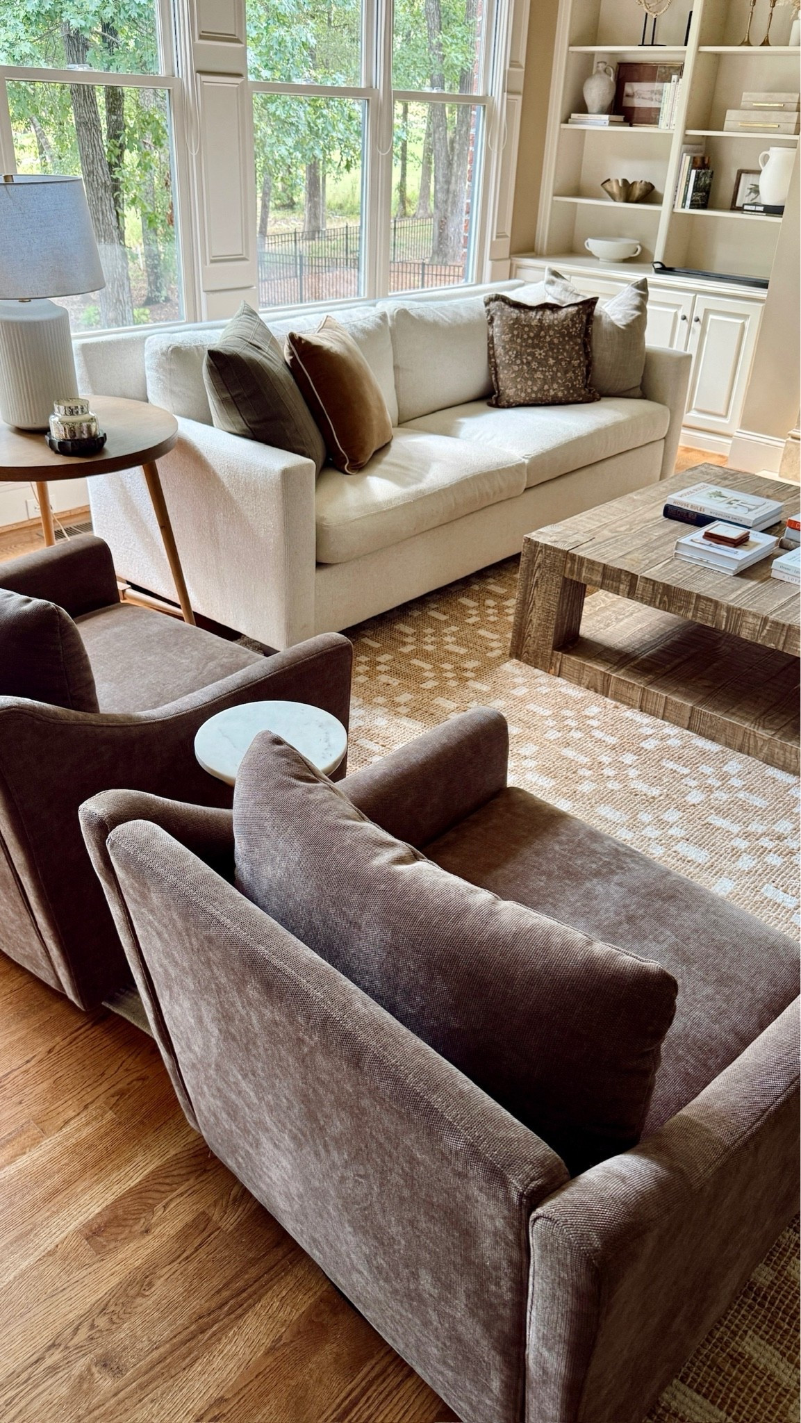This is our new living room, we still love our pottery barn sofas, and these Walmart chairs are so comfortable! The chairs are on sale today, which makes them a steal of a deal!￼￼
#ltksale #sale