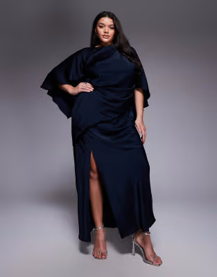 ASOS DESIGN Curve satin ruffle cape sleeve maxi dress with open back detail and high split in nav... | ASOS (Global)