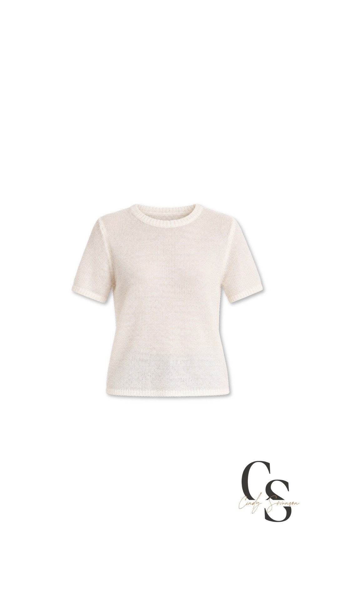 One of my favorite Target sweater finds! I have this knit sweater in red, but I wanted to share this beautiful ivory color with you, too. It’s such a timeless piece that you can wear with jeans and loafers for an easy everyday look, or dress up with tailored trousers and ankle boots for lunch or dinner out.

The short sleeves make it a lovely option for layering, too. It comes in several colors, so you can choose the one that works best with your wardrobe!