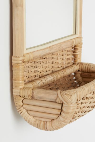 Mirror with a frame and braided storage basket in rattan. Rounded top edge with a large loop for ... | H&M (US)