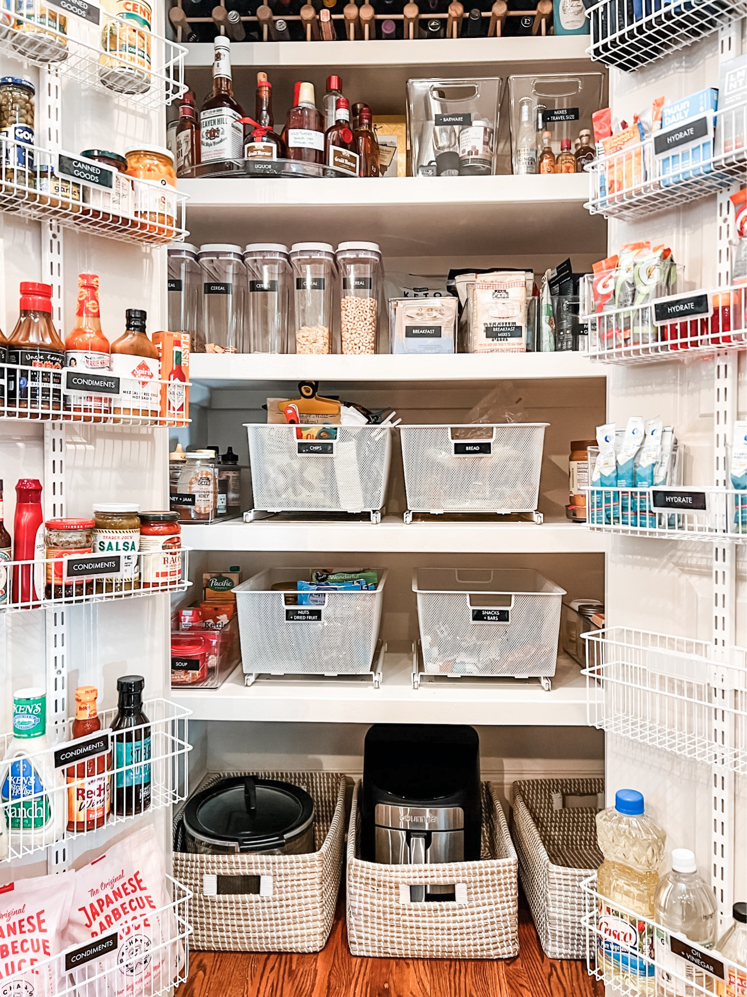 Can smaller pantries still work and give you the storage you need? YES!! You can have a super functional and stylish pantry that offers TONS of storage space and it doesn’t have to be a walk-in! We added storage space by utilizing the doors and these over the door racks. Then we used various baskets and bins for categorizing items. Labels finish the space off and bring this pantry over the top!

#LTKfamily #LTKstyletip #LTKhome