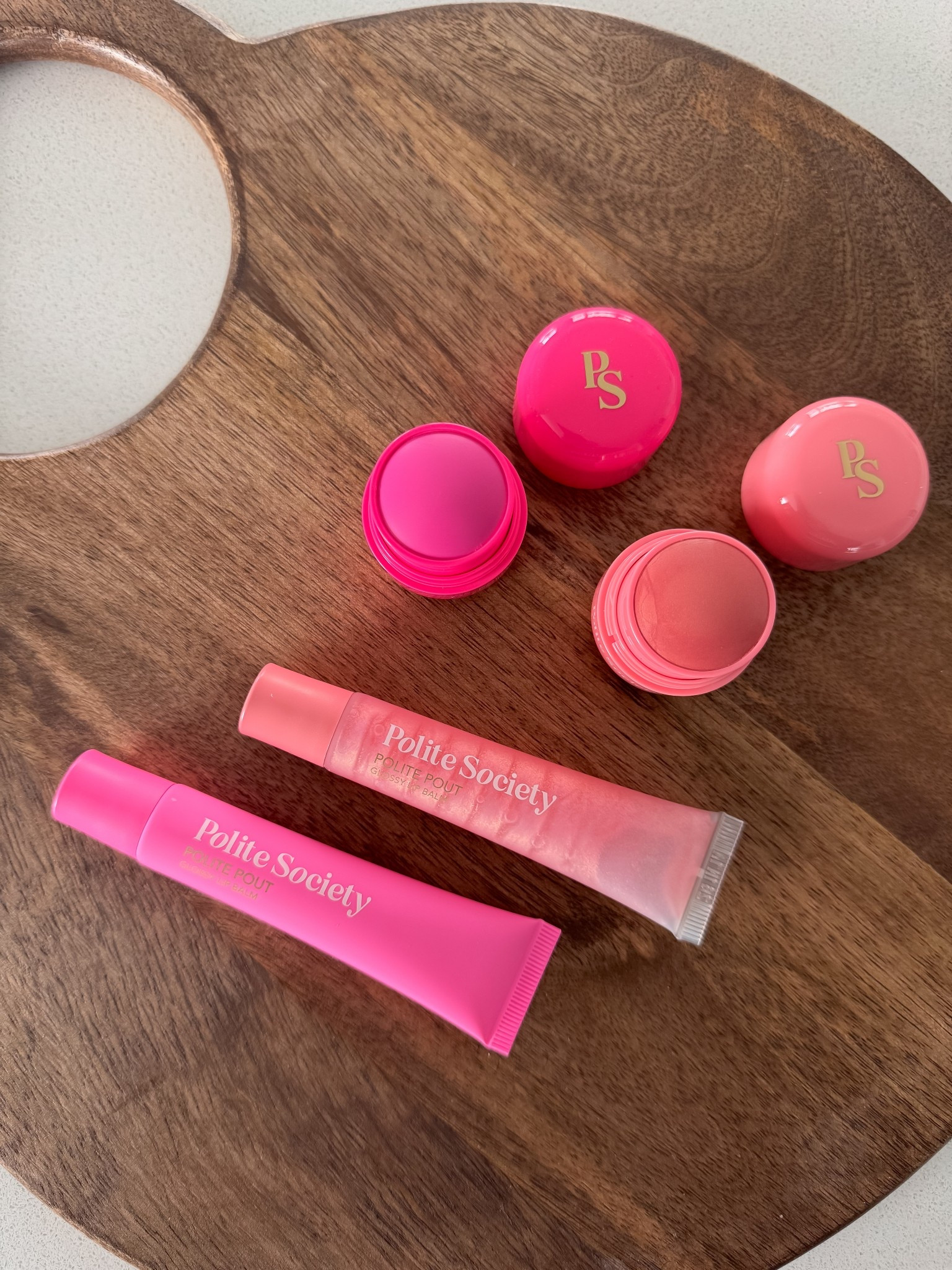 The choke hold this brand has over me is crazy. These Limited Edition powder blush sticks are so pretty on and off the skin. 
Blurring, hybrid formula creates a luxuriously sensorial experience when applied, combining the flexible rich color and blendability of a cream with the look and feel of a powder
Shades shown are Malibu and Miami. I also own Sydney.

Limited Edition Lips gloss shades are Peach Bellini and Jelly Bean.

Polite Society • Polite Pops • Polite Pout • Blush Sticks • Lip Gloss • Beauty • Limited Edition 

#LTKBeauty #LTKStyleTip #LTKSpringSale