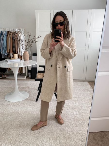 J.crew brushed wool top coat. Love the fit of this one. I’m in the petite xs. Stunning coat!

Coat - J.crew petite xs
Tee - Everlane small
Jeans - Gap petite 26. Sizes up 2 sizes. 
Flats - Mansur Gavriel 35
Sunglasses - YSL 