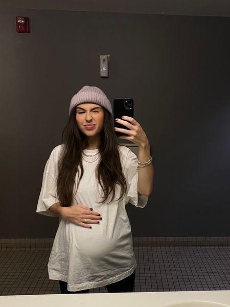 maternity outfit, third trimester outfit, oversized tee, beanie, winter outfit for pregnancy, worship leader outfit 

#LTKbump #LTKbaby #LTKfindsunder50
