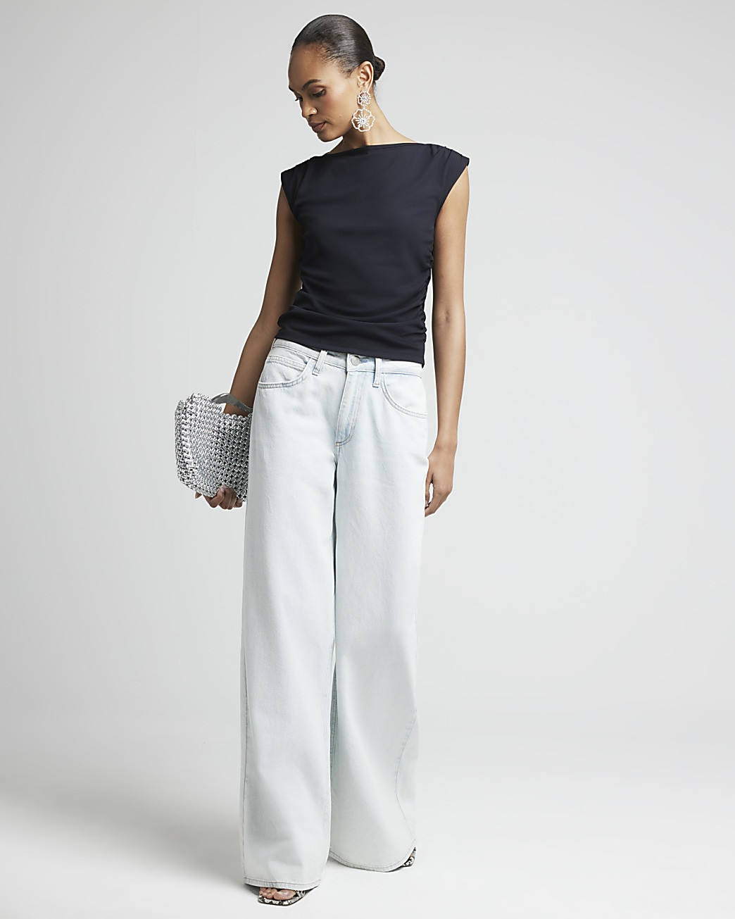 Black ribbed ruched side vest top | River Island (UK & IE)