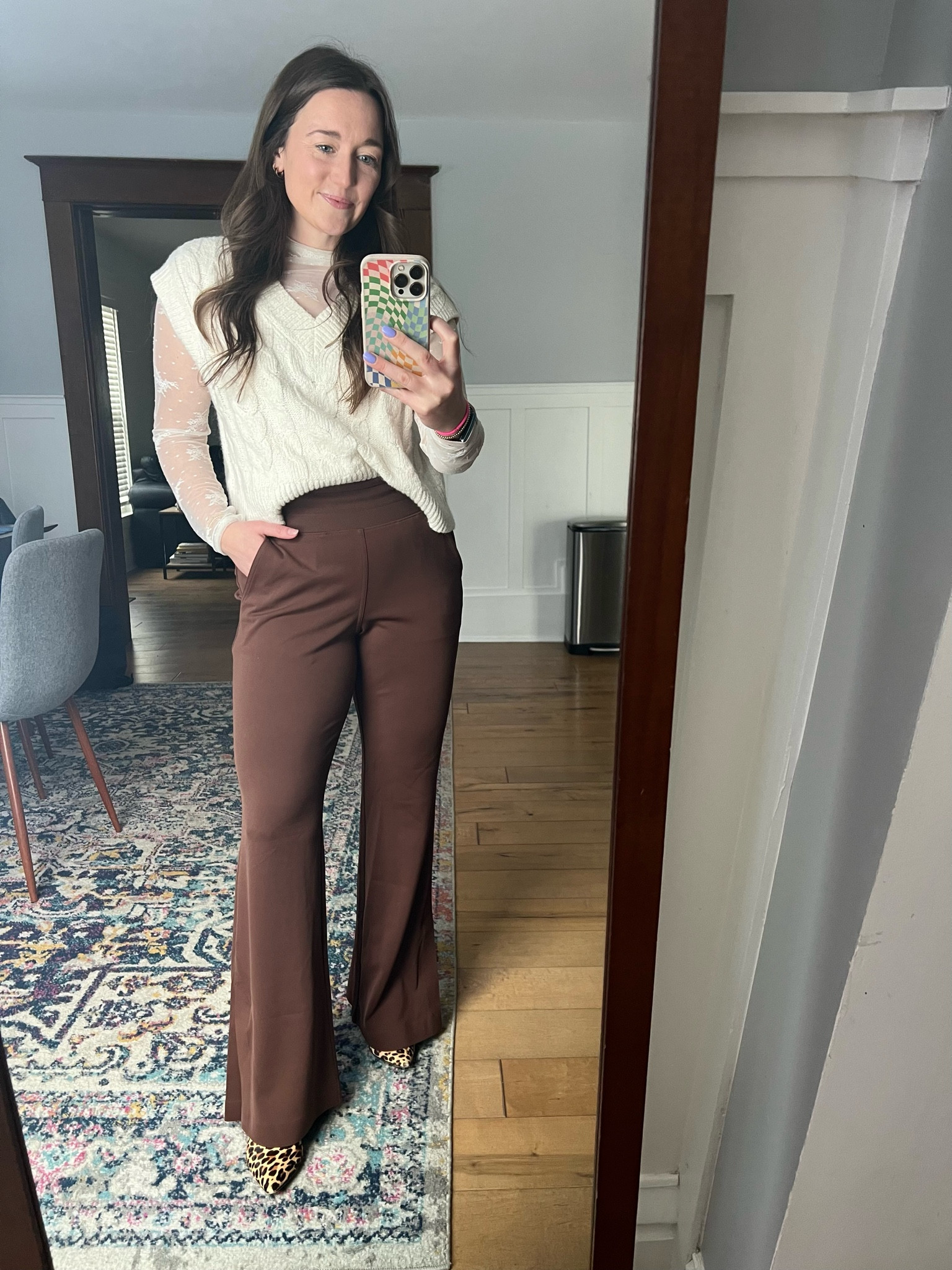 Outfit of the day - layered a lace Aerie top underneath a sweater vest with comfy Athleta pants and leopard boots!