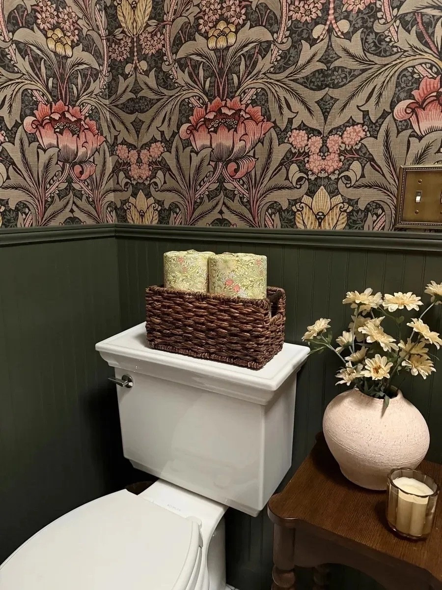 This toilet paper roll trick is honestly such a genius little detail and I can't stop raving about it! It makes the whole bathroom feel so much more polished and intentional — I linked everything I used along with all my powder room favorites!

bathroom styling hack, Lowe's vanity, peel and stick wallpaper, gold sconce, oval mirror, marble mosaic tile, powder room refresh, easy bathroom upgrade

#LTKHome