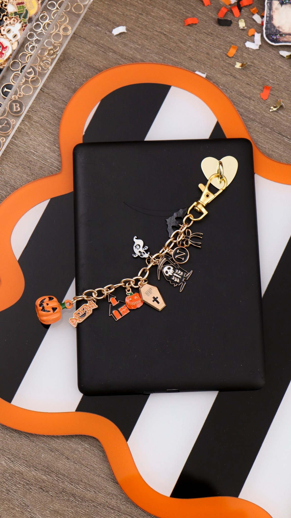 Activities your book club will actually love 👻📚✨

Forget awkward icebreakers—this spooky Kindle charm station is part DIY, part favor, and all fun. 🖤🔮
Guests get hands-on with beads + Halloween charms → and leave with a one-of-a-kind accessory for their Kindle (or e-reader).
Because book club should be more than just snacks + discussion.
 
Follow for more Halloween DIYs, party inspo, and bookish crafts you’ll actually want to try. 🕸️🎃

#LTKParties #LTKSeasonal #LTKHalloween
