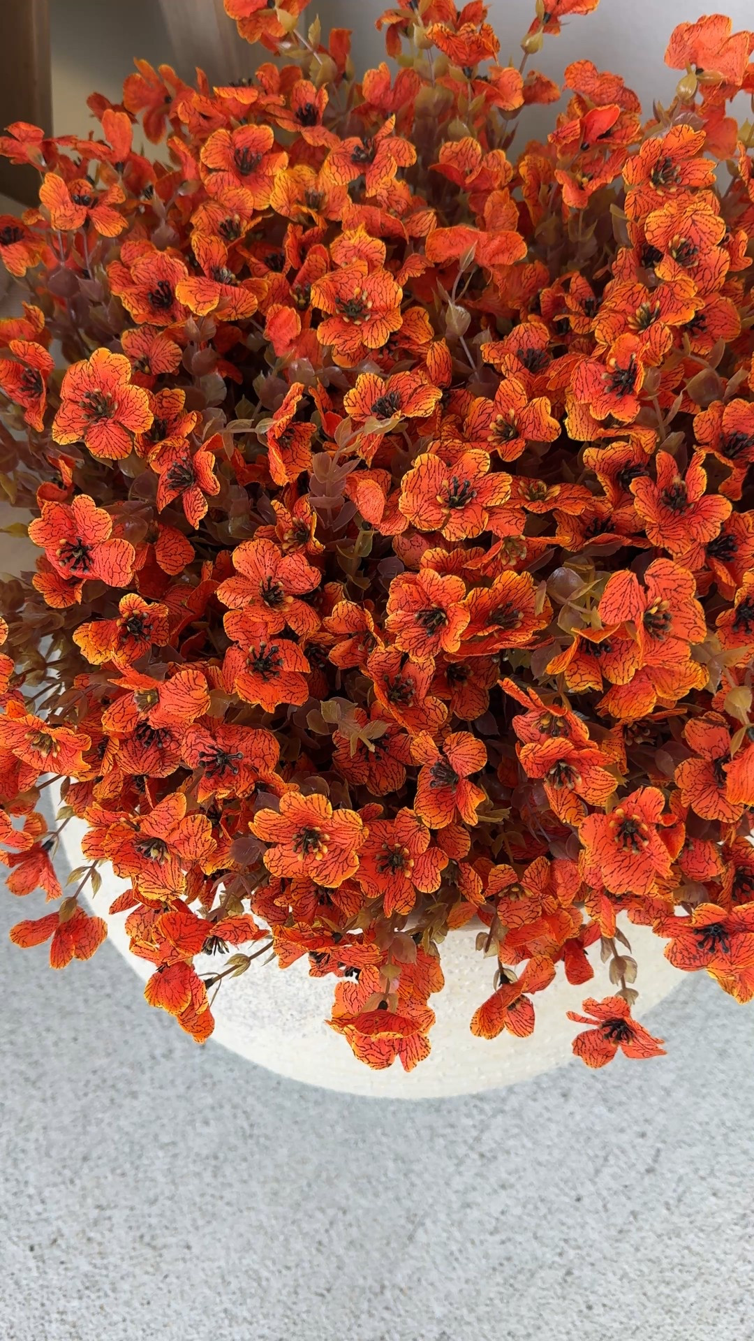 Incredible fake mums that never die 👏 I used two packs to fill this planter and I used some foam as a filler to keep them in place. 