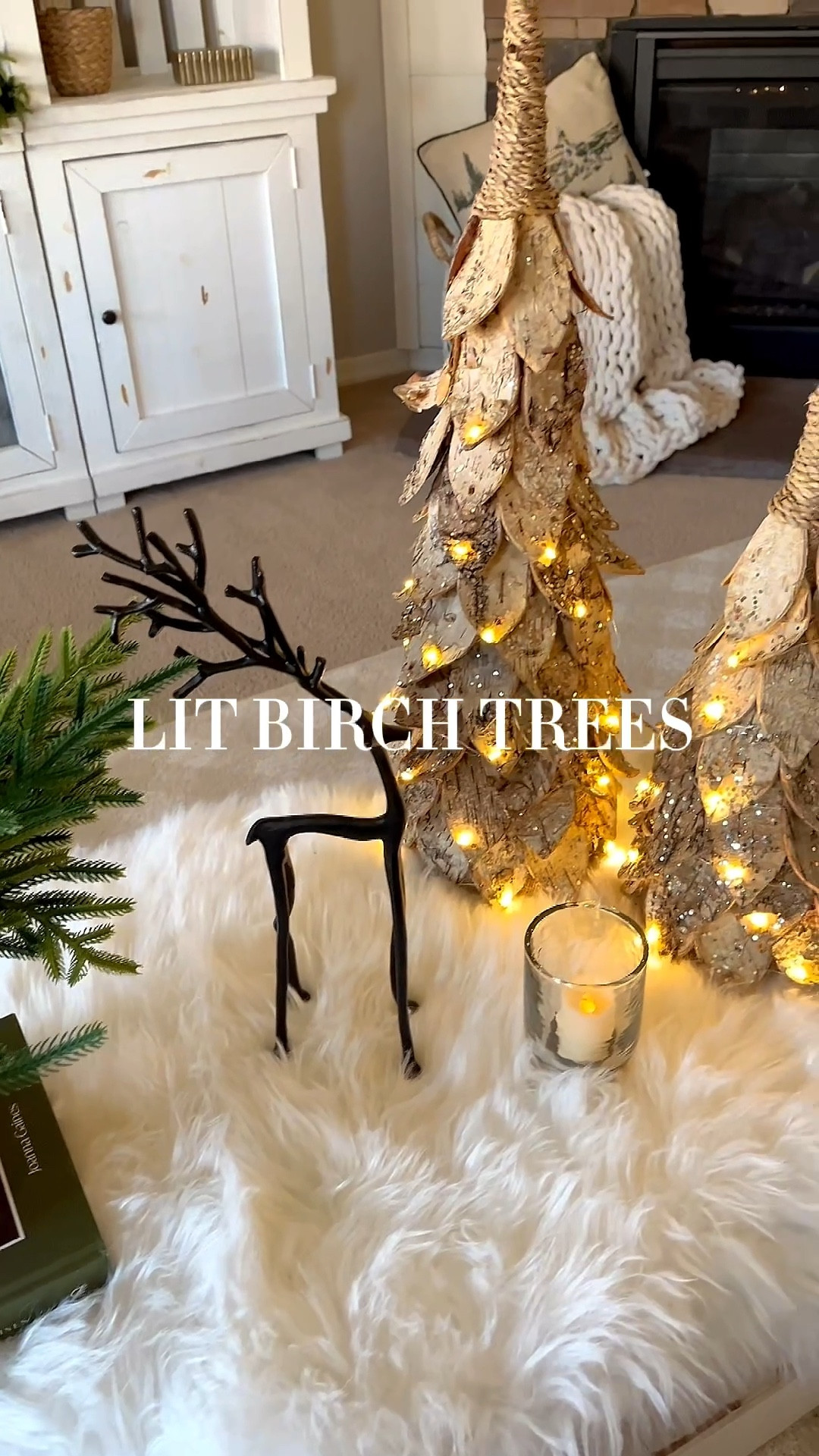 Lit birch trees!
Follow @lifeinmyarizonahome on Instagram for more holiday ideas and inspiration. 

I’m showing a winter/Christmas coffee table styling idea with these beautiful lit birch trees. I’m so impressed with these and I’m excited to use them in my holiday decor this season!  They have such beautiful detail and I love how they light up and can be set on a timer.  A furry rug, black reindeer, a glass hammered votive holder, and these Norfolk stems all help complete the look!

#christmasdecor #holidaydecor #litbirchtree #coffeetable #coffeetabledecor #homedecor #coffeetablestyling #wintercoffeetable 

#LTKHome #LTKHoliday #LTKSeasonal