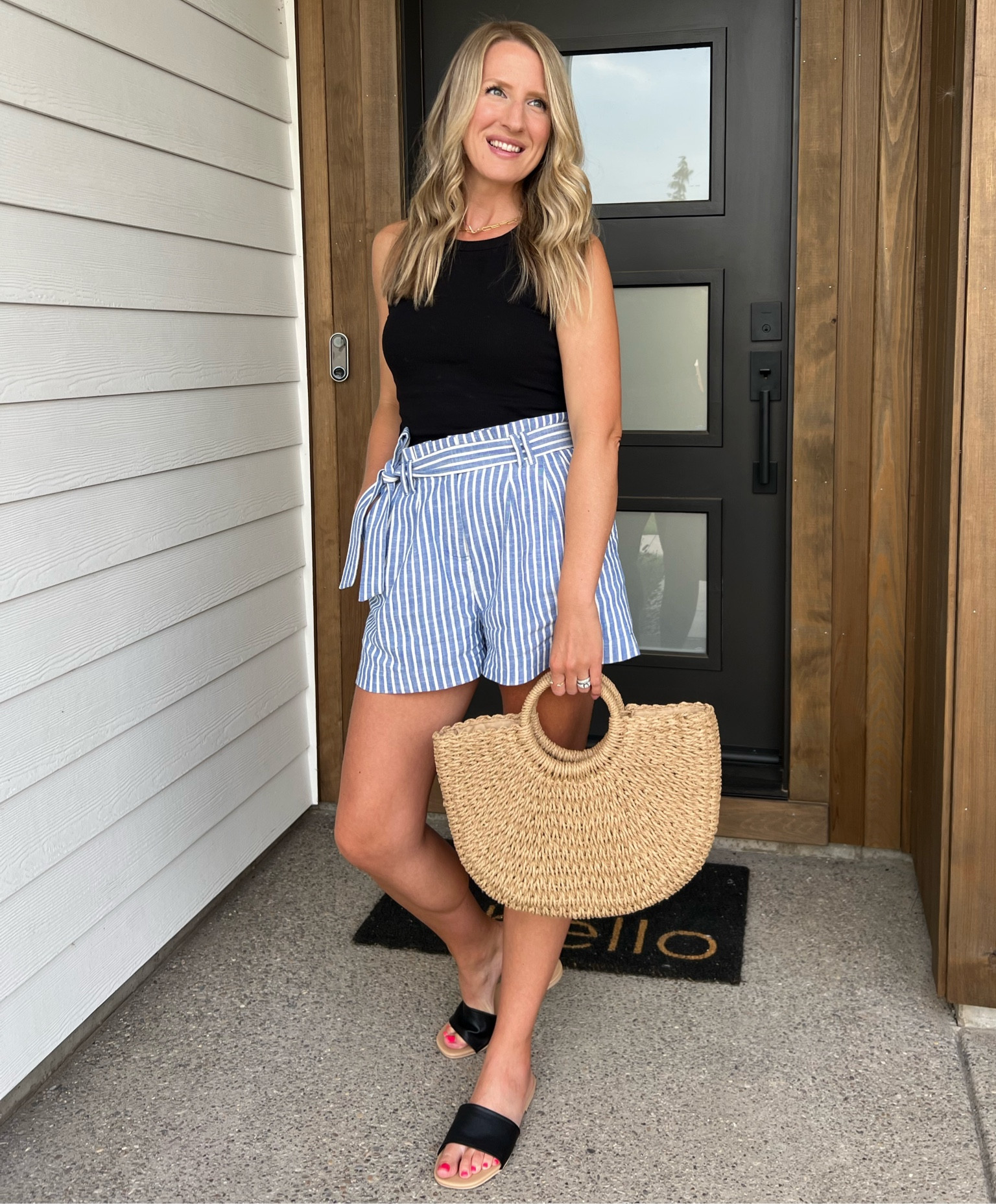 Paper bag shorts, a high neck tank, sandals and a straw bag make the perfect summer outfit!

#LTKstyletip #LTKFind #LTKunder100