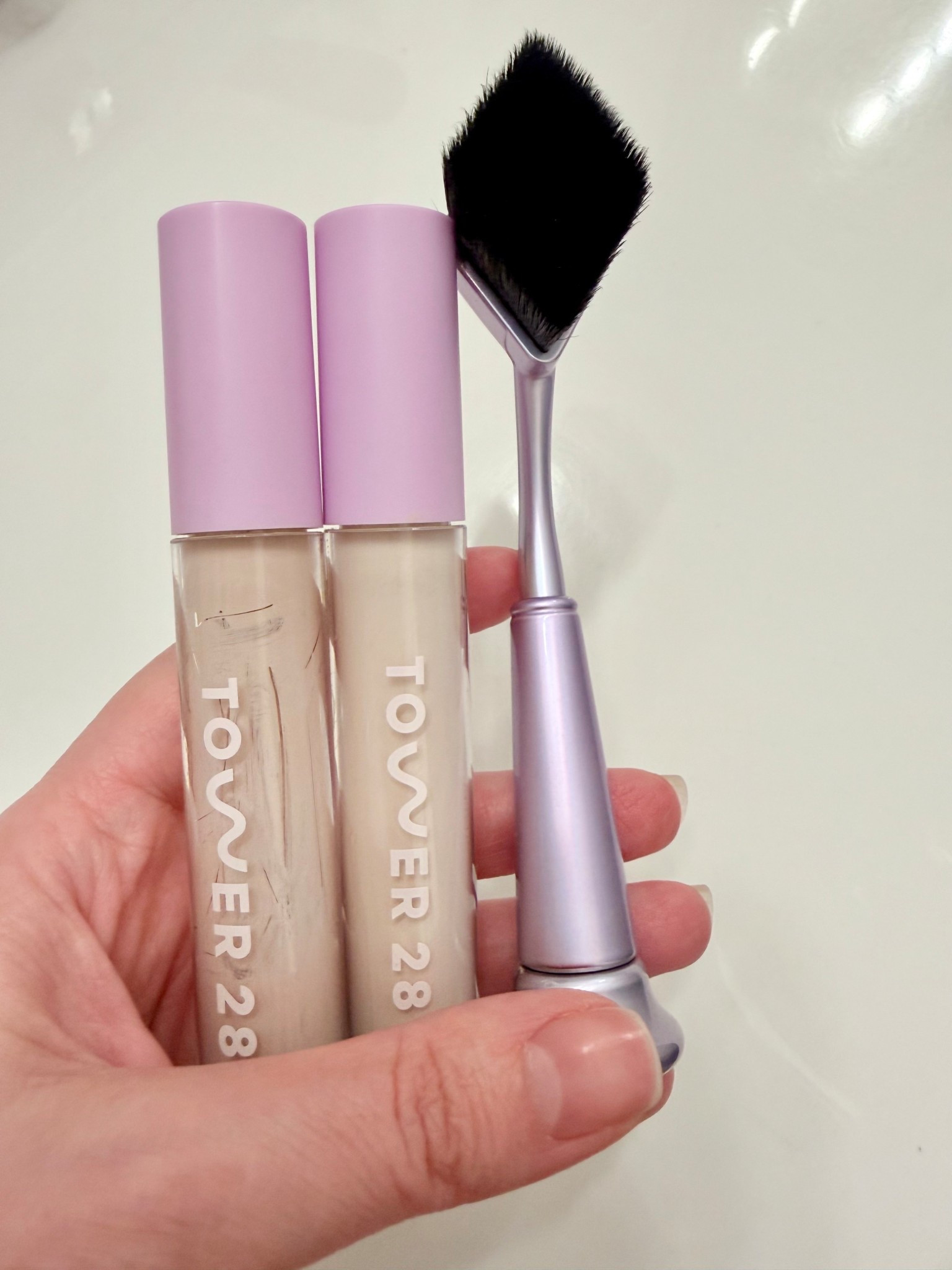 The best concealer! It’s from Tower 28 Beauty, a swipe All-Over Hydrating Serum Concealer with 18-HR Wear. This Tarte brush is perfect for applying it. 