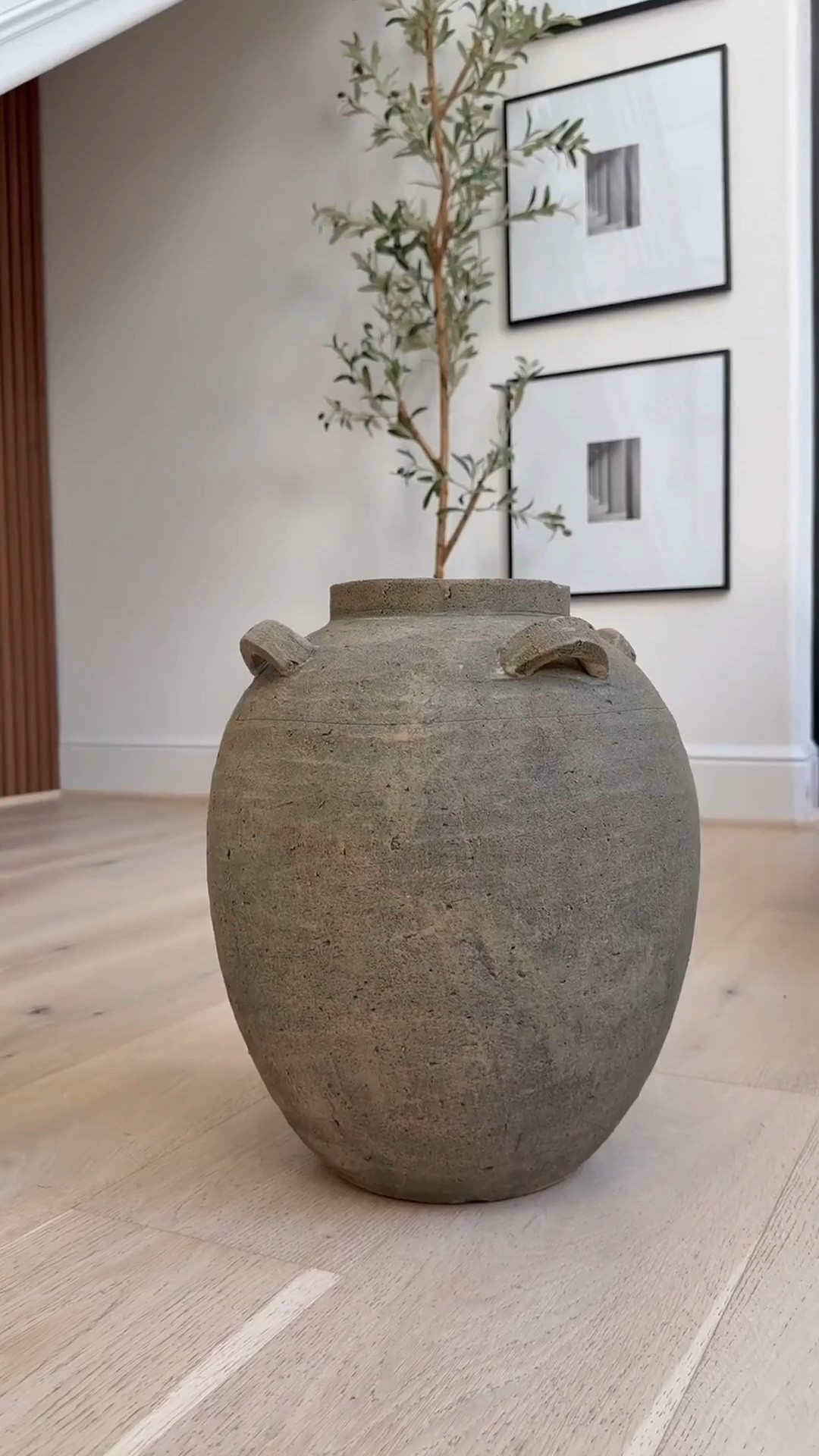 My bathroom vanity feels so warm and inviting with a few seasonal accents like these cimicifuga stems 🌿 The brown accent chair adds the perfect cozy tone 🪑 and I love how the backsplash and vanity combo keep everything neutral while still adding warmth 🤍

My artwork has been such a favorite 🎨 available in so many sizes and styles, it’s perfect 🤩 I’m also obsessed with my white oak console and dining tables that carry that same warmth throughout my home. And this vintage-inspired vase is so versatile, it works beautifully as a planter and adds that timeless look.🏺✨

#LTKHome #LTKSaleAlert