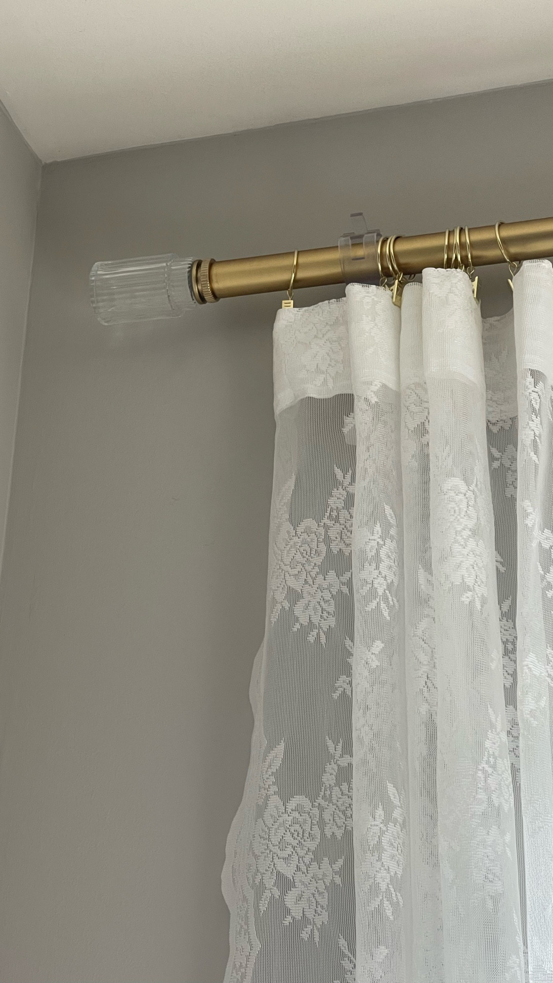 Dorm Room curtain rod hack! Also great for anyone renting. These self adhesive rod holders are genius! We got the clear but they also come in other colors. I absolutely love the brass rod and clip rings we found for our daughter’s dorm. The fluted glass finials are so beautiful! And the lace curtains are light enough to be ok with the rod holders. They are like command strips to protect the walls.😄🙌🏻

#LTKHome
