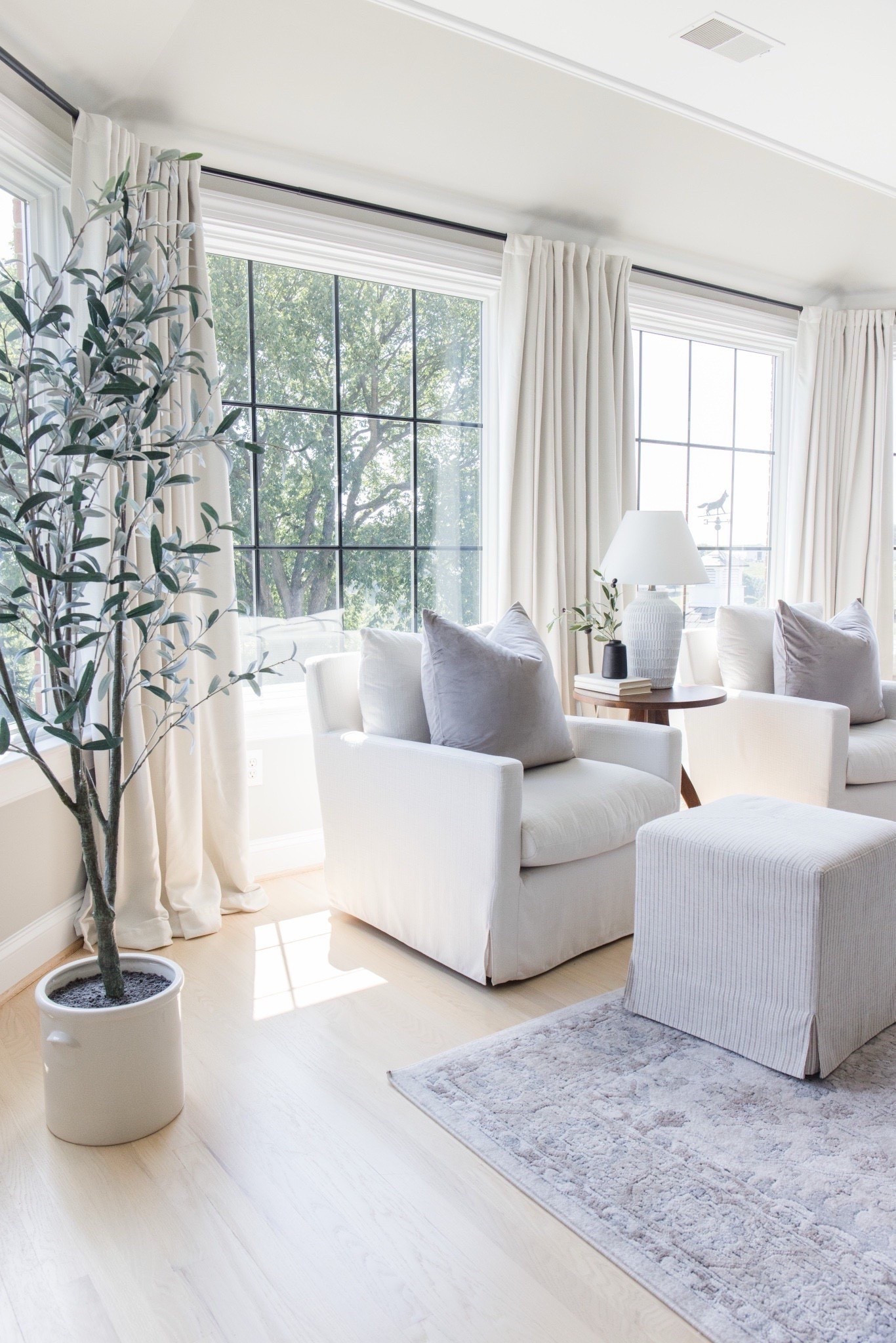 I love all the light we get in our bedroom! These chairs have been such a favorite spot. #archedmanor #modernhome #neutralhome #homedecor #casualstyle #neutralstyle 

Home  home decor  neutral decor  faux olive tree  planter  area rug  cube ottoman  accent chair  living room  TheArchedManor  




#LTKSeasonal #LTKHome