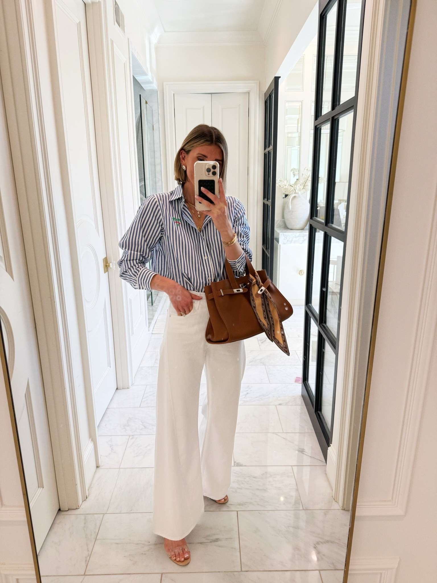 The viral mother wide leg jeans - in a new white wash for summer. I sized down one size