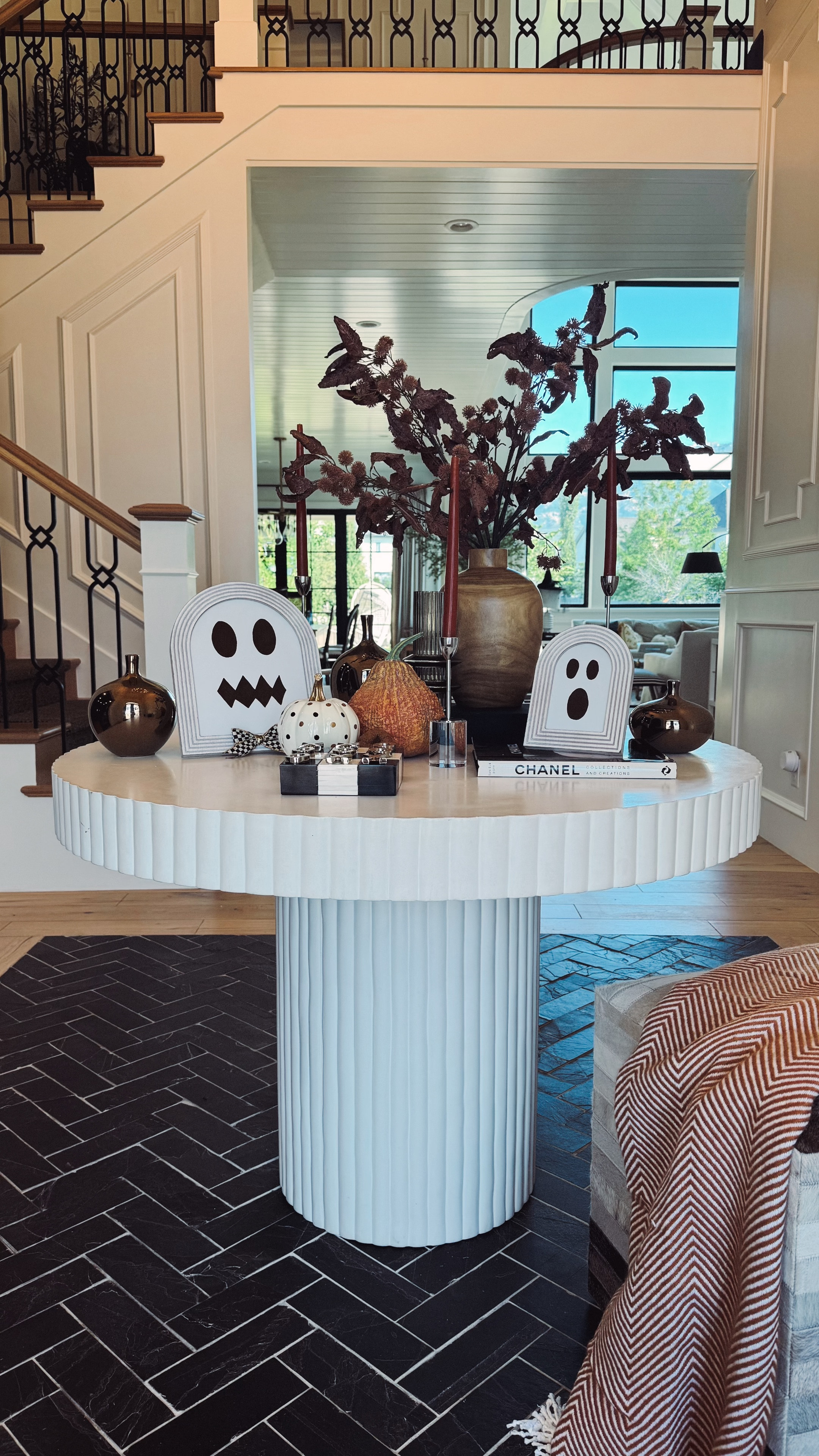 Fall front entry table styling. 
Labor day sale on similar fluted white pedestal table
Fall faux stems
Candle sticks
TikTok toe game
Set of 3 metallic vases
Designer Coffee table books 
Ghosts frames diy - see my reels page 



#LTKHome #LTKSeasonal #LTKFallSale
