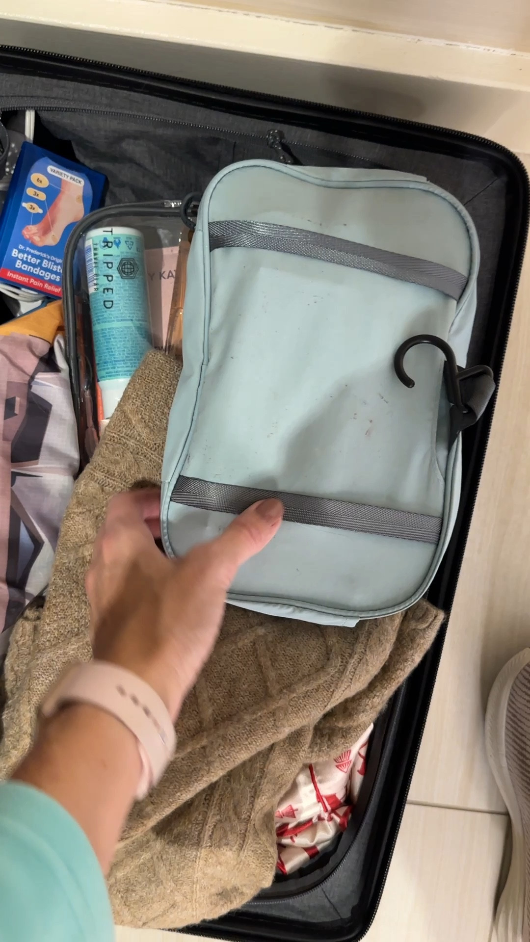 Travel tip for toiletries. This one can be a pouch. 3 colors. Set includes toiletry bag, liquids bag that has a handle and a cube for travel essentials. Stretchy waterproof band-aids are so great! Sweater is size Large and super soft. 3 colors and I’m 5’8” size 10. #travel #travelessential #toiletries #over50 #midlife 

#LTKOver40 #LTKTravel