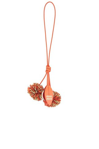 Miu Miu Pom Pom Bag Charm in Orange | FWRD 