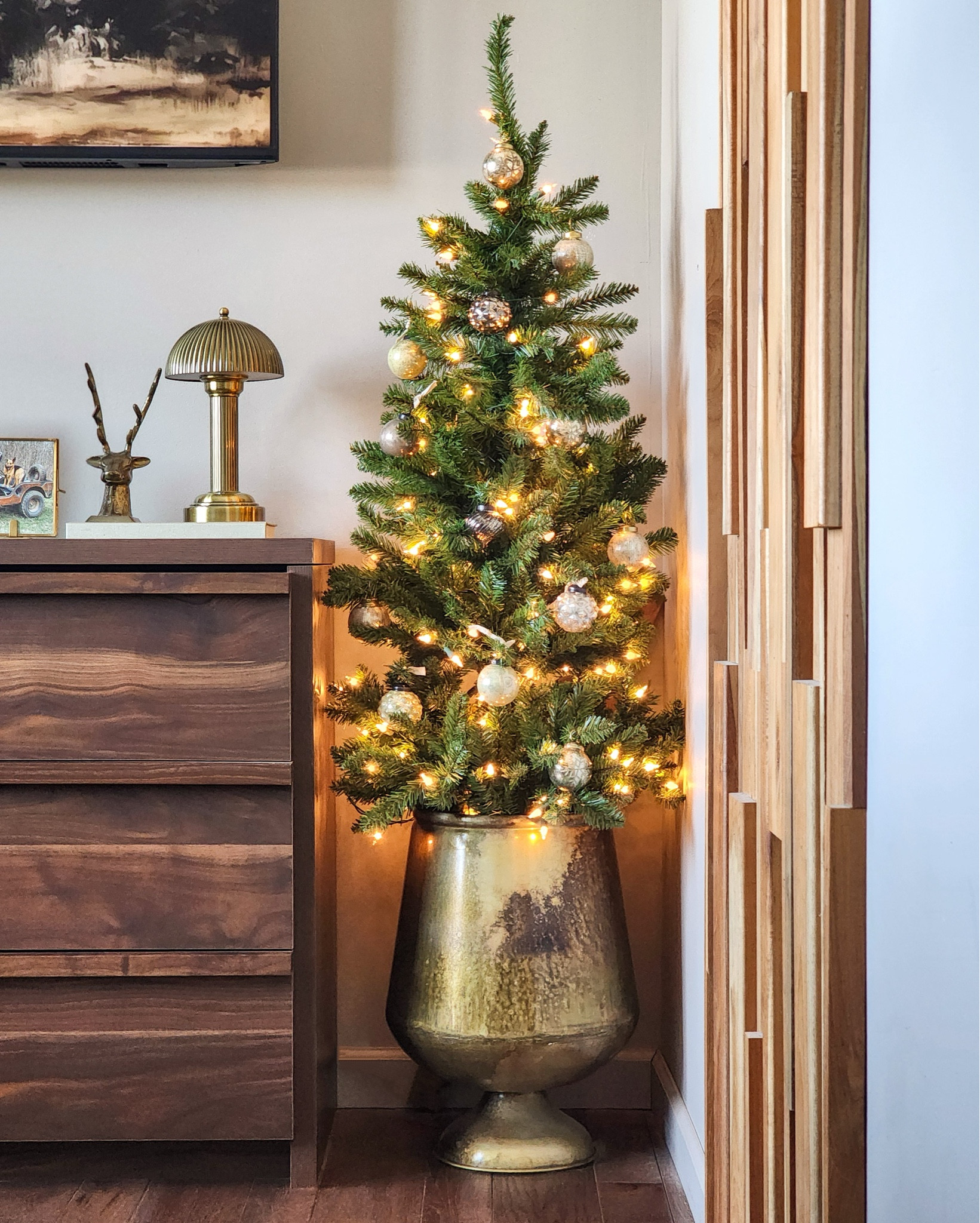 This little corner of our bedroom was the first space I decorated for Christmas and ironically became the only space decorated for the majority of the season.

It brought me glimmers of light during dark times and joy when all I could feel was sadness.

My dream for my home is to be my place of comfort and peace which this space absolutely was. 

Until next season, little tree.

#LTKHome #LTKSeasonal