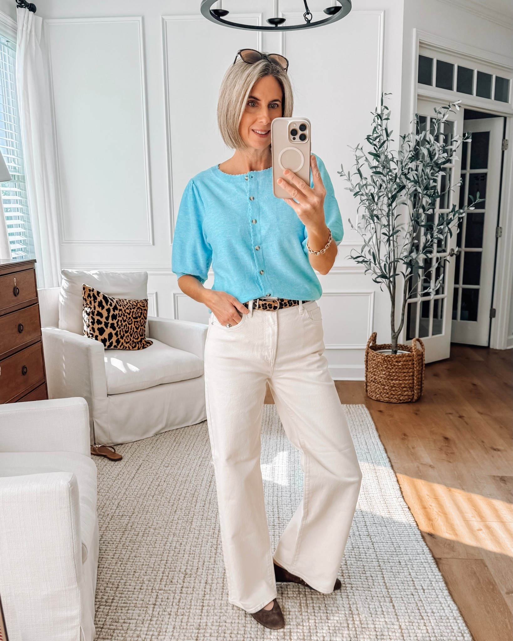 The prettiest light blue cardigan from Amazon. Soft and lightweight wearing a small 
Wide leg cream colored jeans wearing a 26/2 

Cardigan sweater | Workwear | White jeans outfit | Spring outfit idea 

#LTKWorkwear #LTKSeasonal #LTKSaleAlert