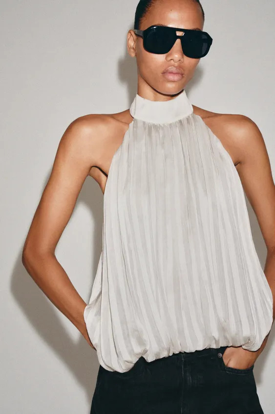 Model height: 179 cmZARA WOMAN COLLECTIONHalter neck top with an open back. Featuring pleated fab... | Zara UK