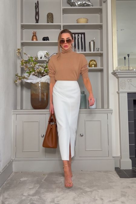 - Karen Millen white skirt pencil midi
- Tan cashmere jumper high neck knit 
- Brown tan tote bag

Use code LAURAB20 for discount 